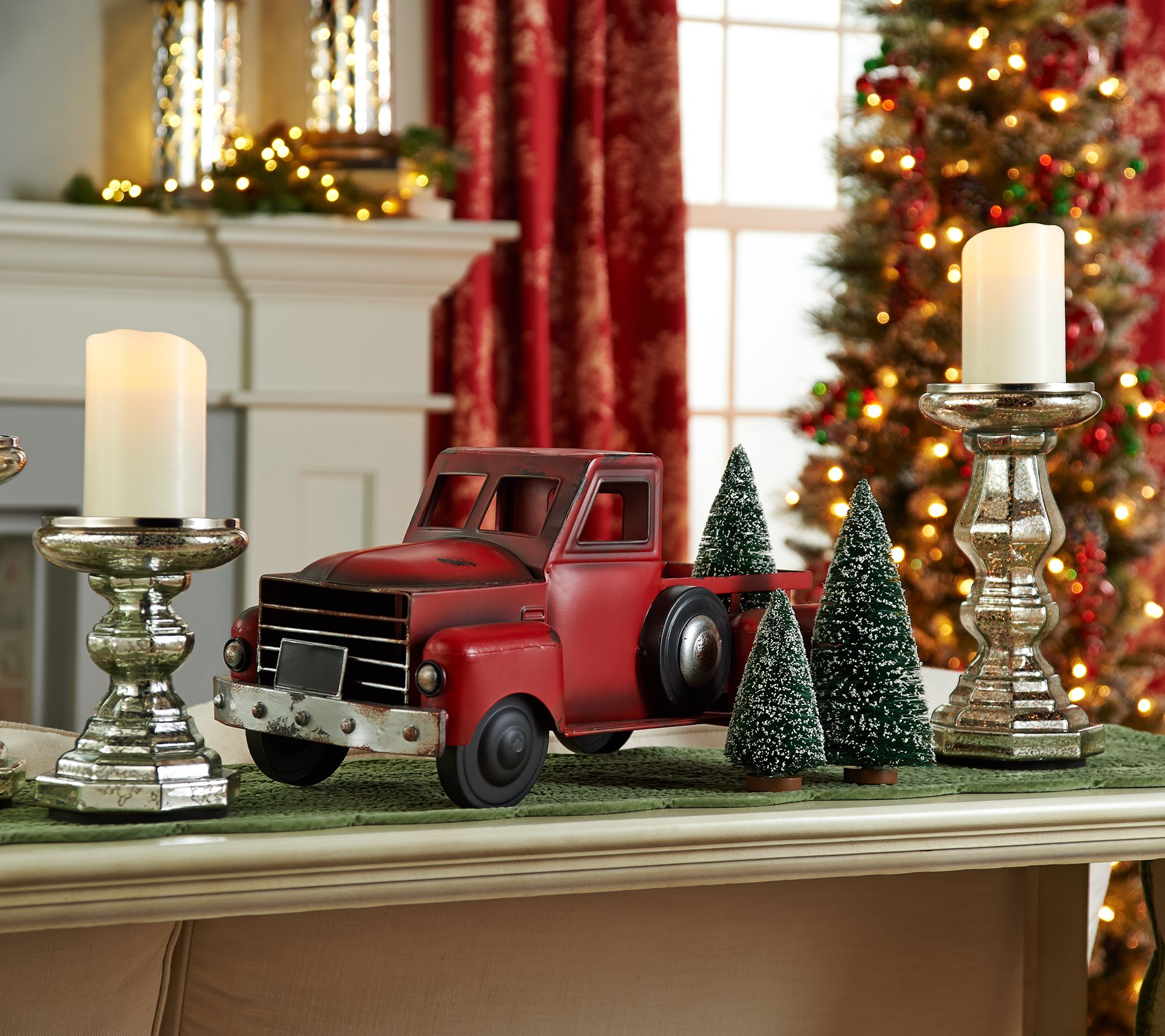 vintage metal red truck with christmas tree