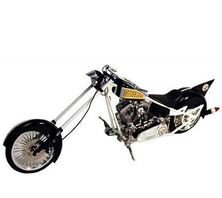 Doug Fraschiero (cq) of Martinez, Calif. rides his mini chopper