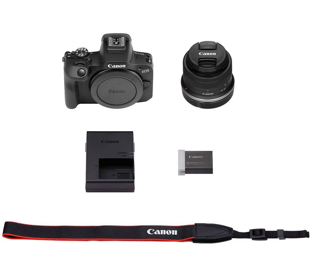 Canon EOS R100 Mirrorless Came ra w/ 18-45mm L ens