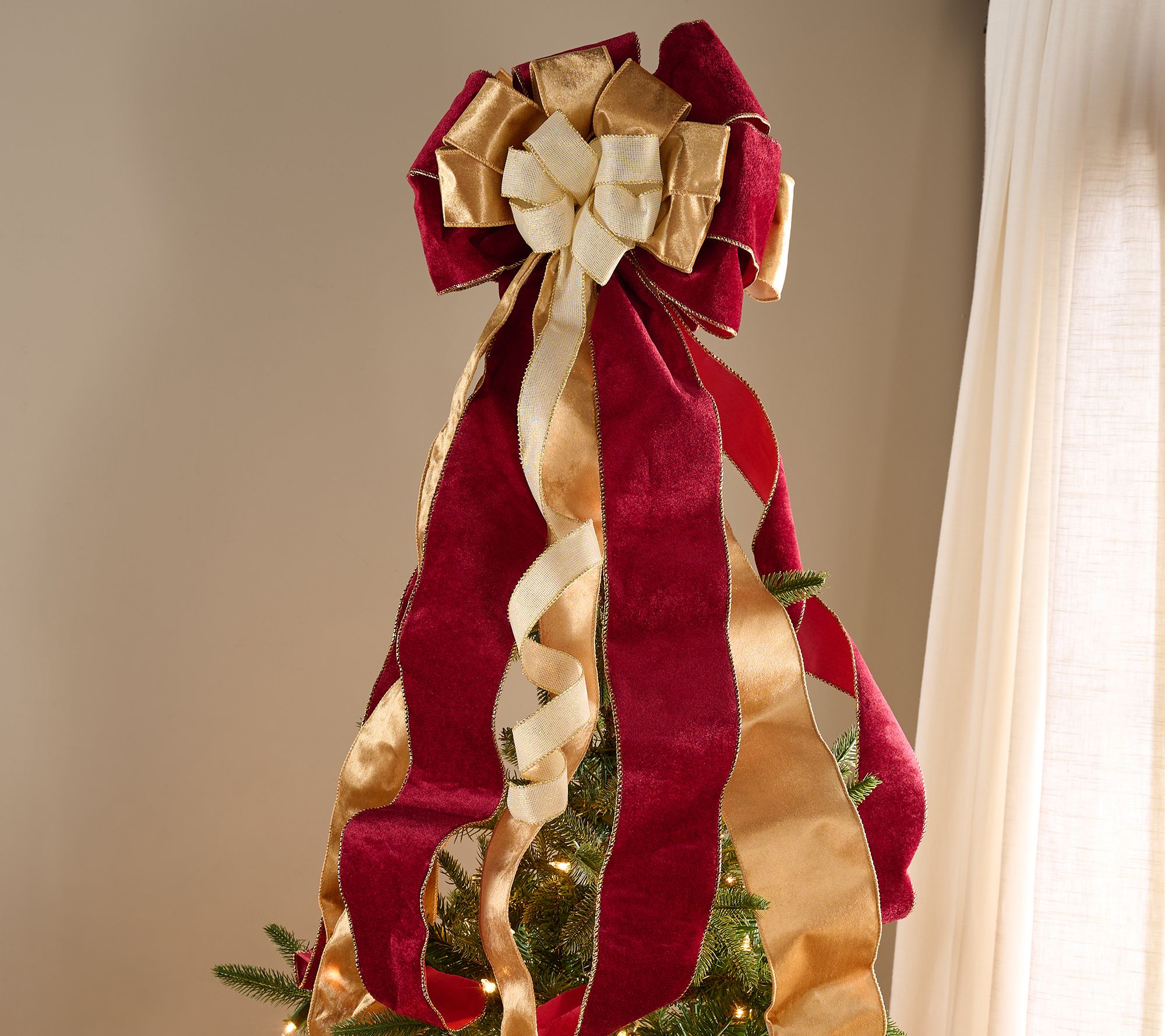 Oversized Bow Tree Topper with Cascading Ribbon by Kim Gravel