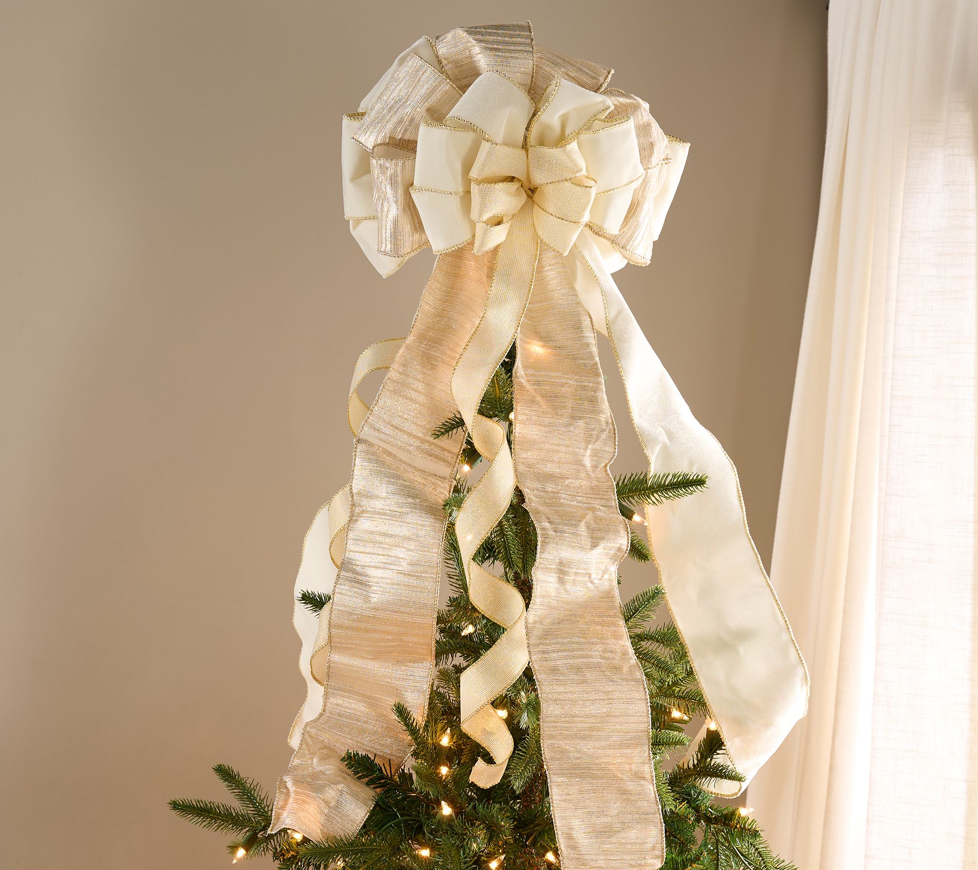 Oversized Bow Tree Topper with Cascading Ribbon by Kim Gravel