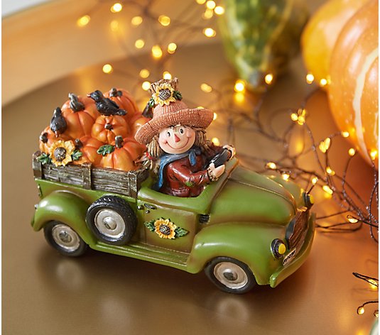 Scarecrow Figure Driving Truck with Pumpkins by Valerie