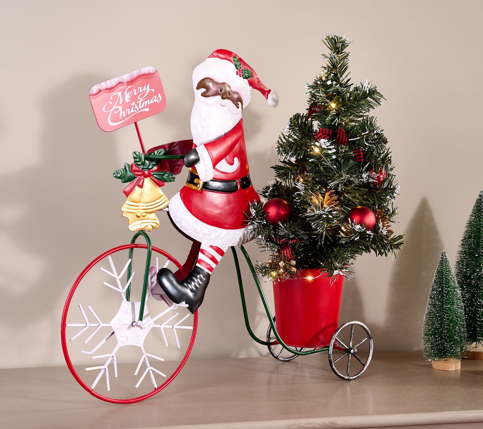 Holiday Figure on Tricycle with Lit Tree by Valerie