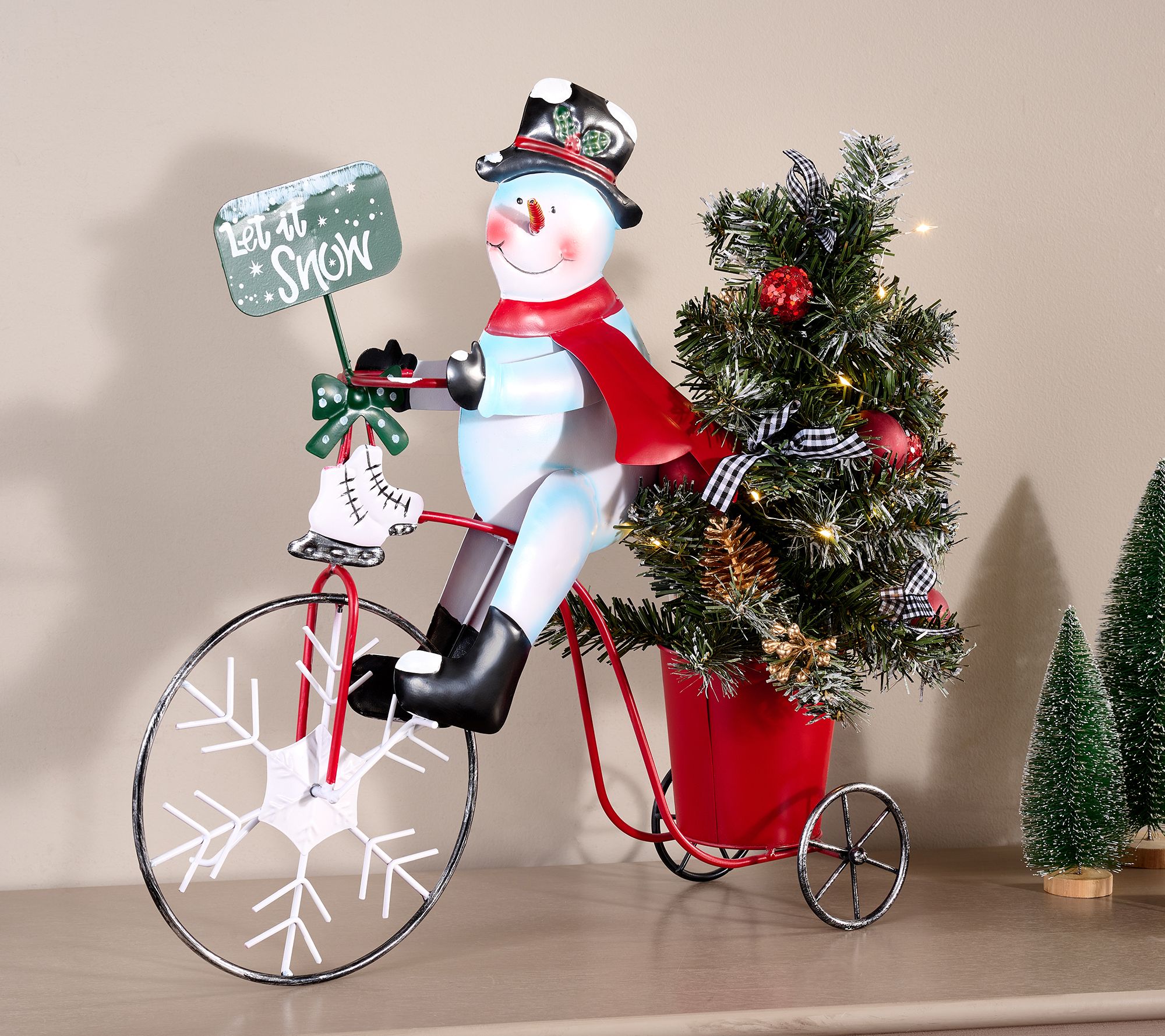 Holiday Figure on Tricycle with Lit Tree by Valerie