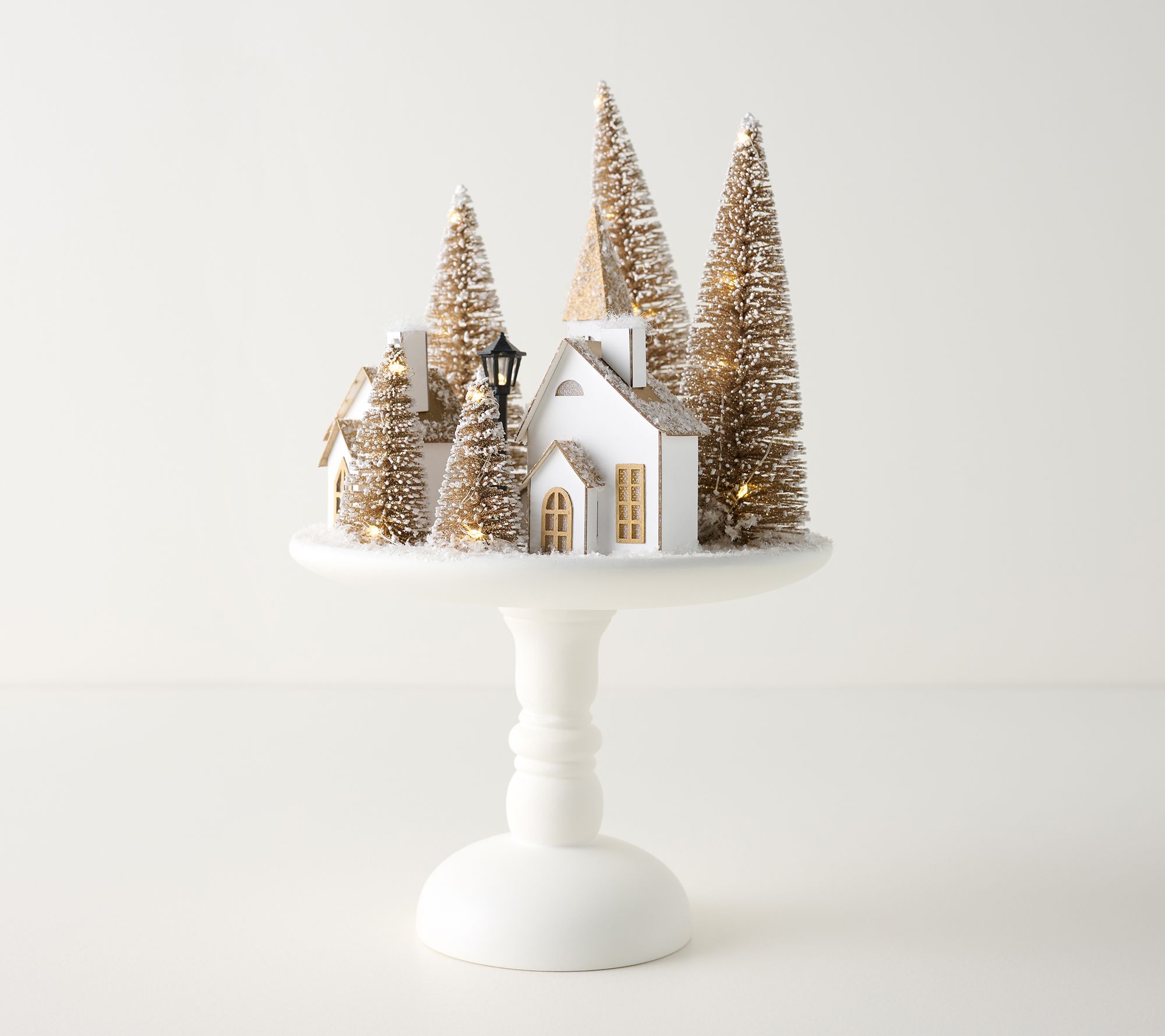Illuminated Vintage Village on Pedestal By Valerie