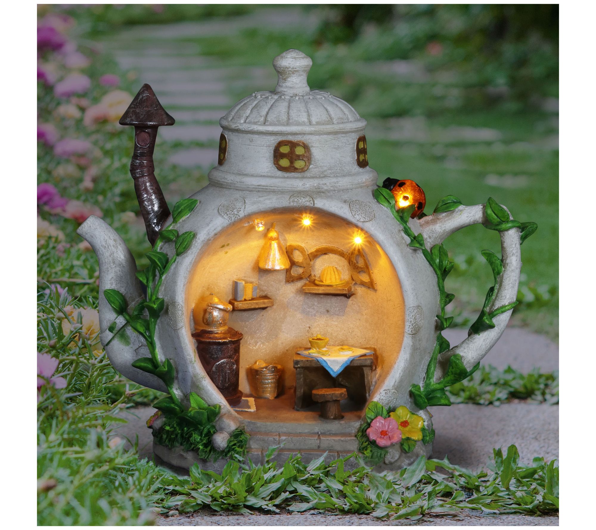 Northlight 7 in. Solar Lighted Flower Tea Pot Outdoor Garden