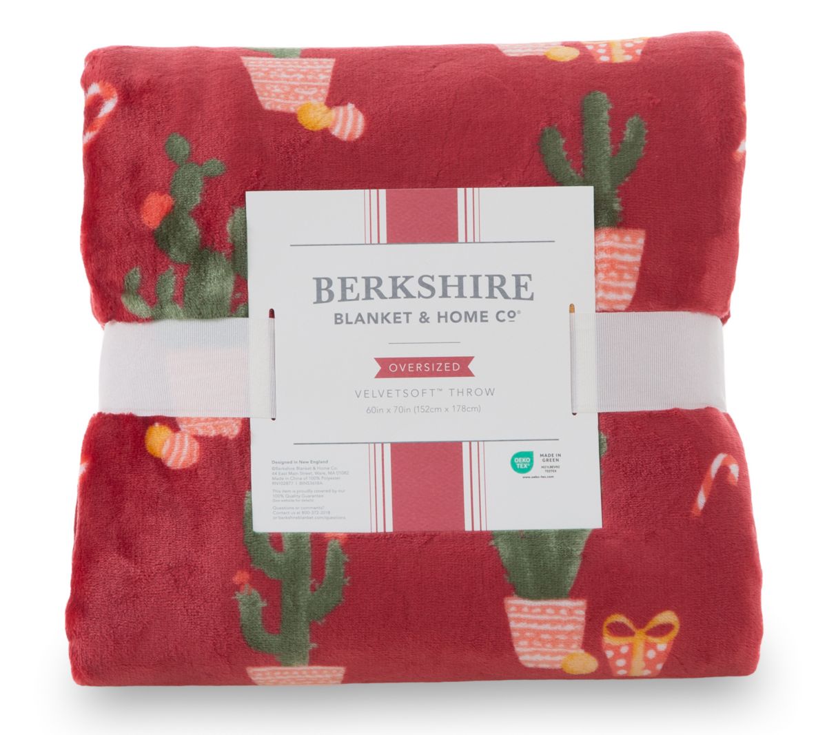 Berkshire Velvetsoft Throw displayed on a sofa, sold by the store