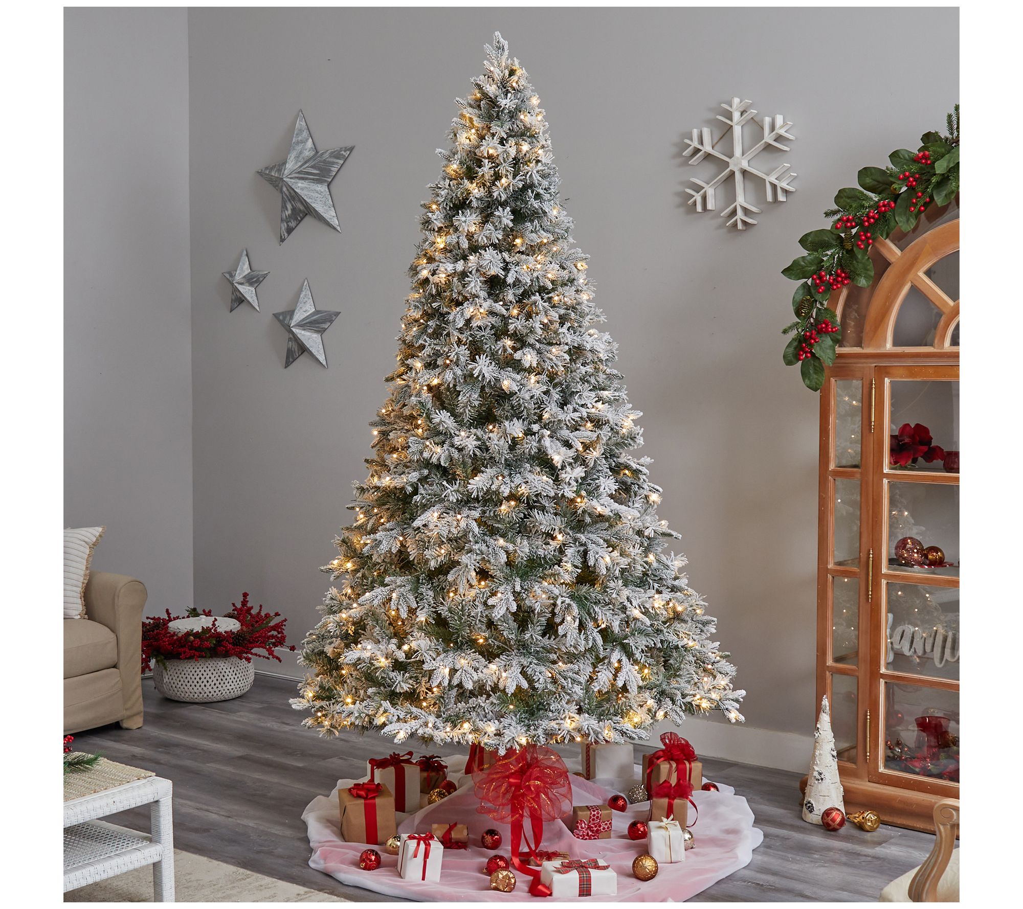 Nearly Natural 9' Flocked Christmas Tree with 650 LED Lights