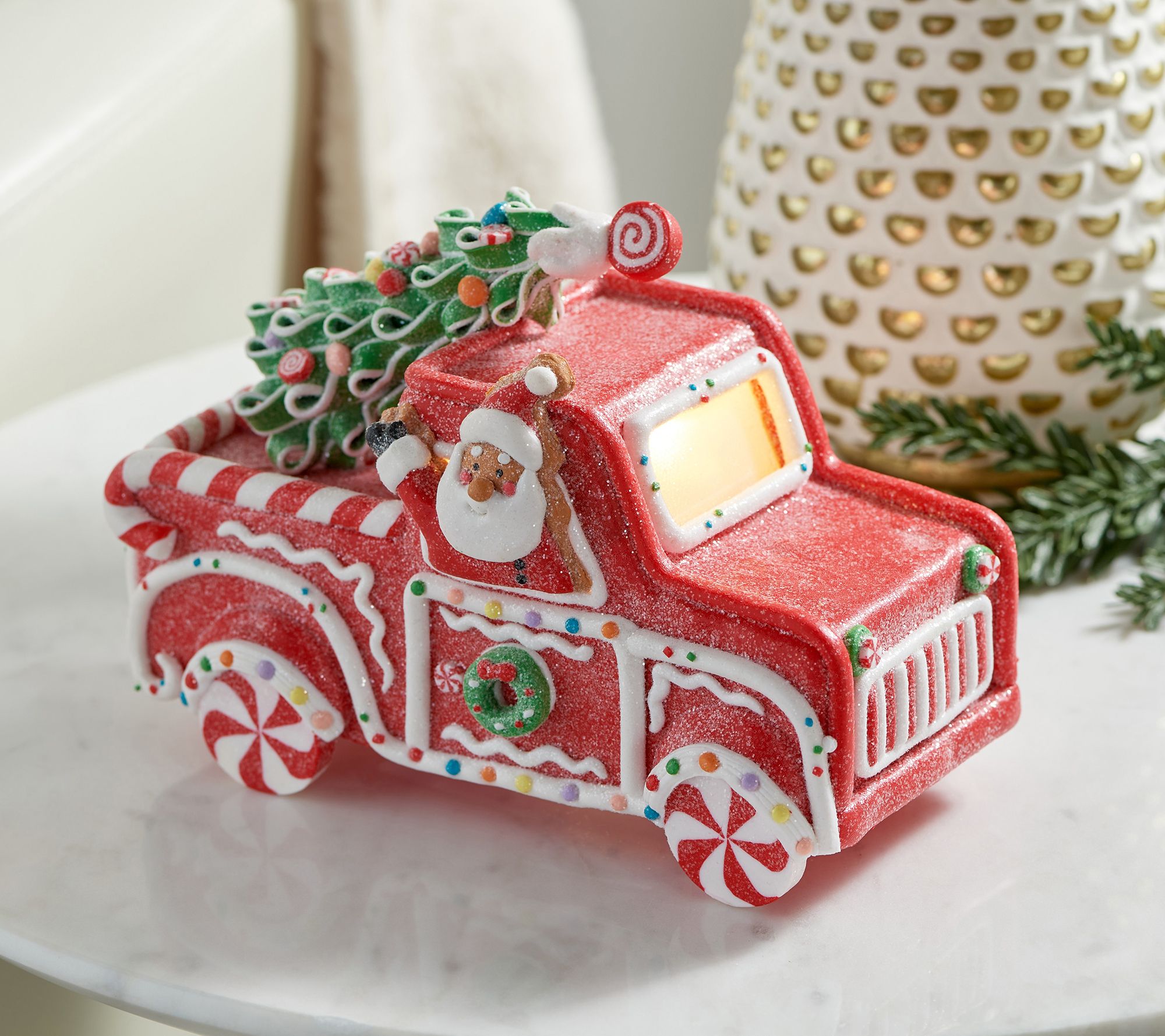 Illuminated Red Gingerbread Truck with Santa by Valerie