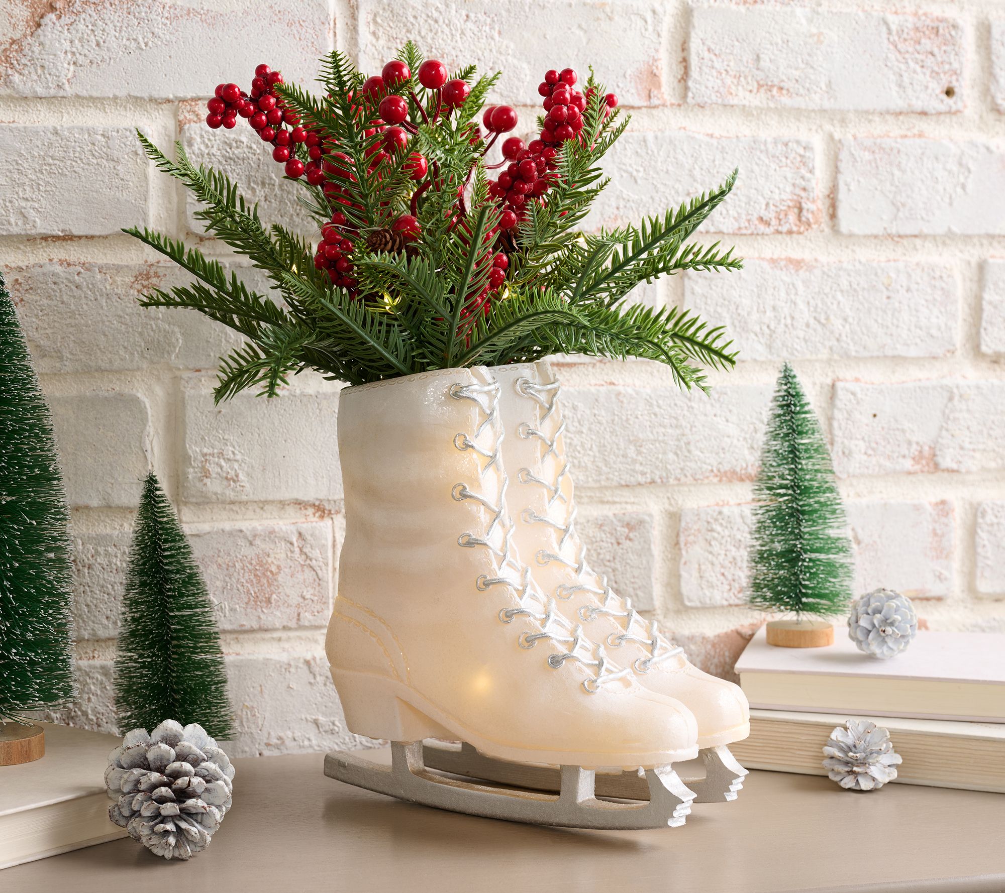 Illuminated Ice Skates with Greenery by Valerie