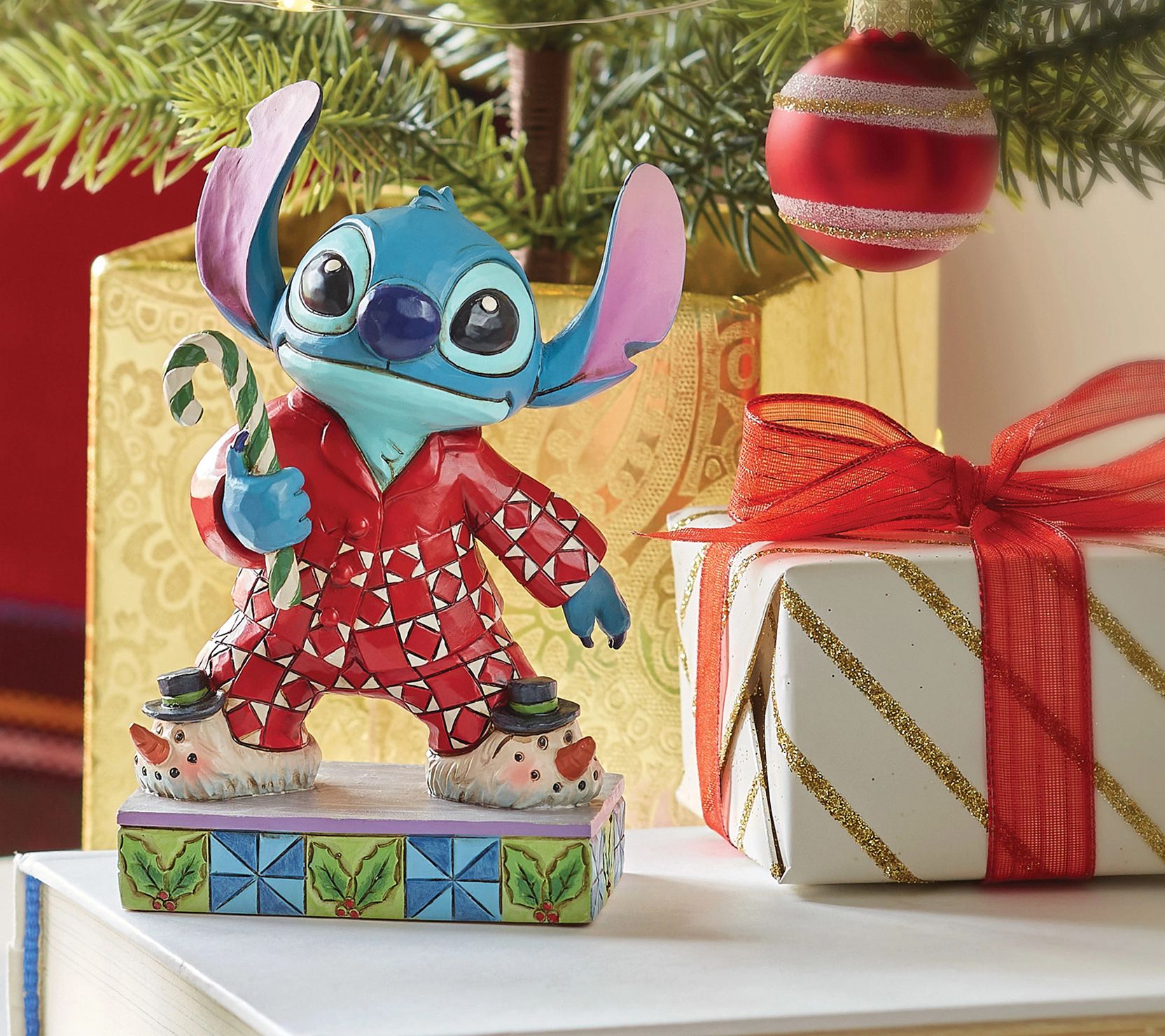 Disney Traditions Stitch in Christmas Pajamas F igurine