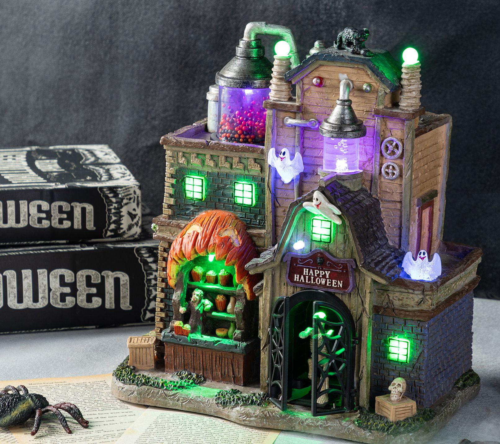 Glitzhome 11"H Lighted Resin Halloween HauntedHouse Village