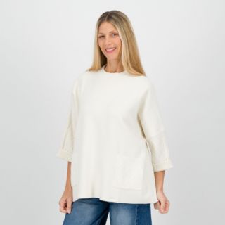 Risskio
Maglia oversize
con lavorazione
a treccia