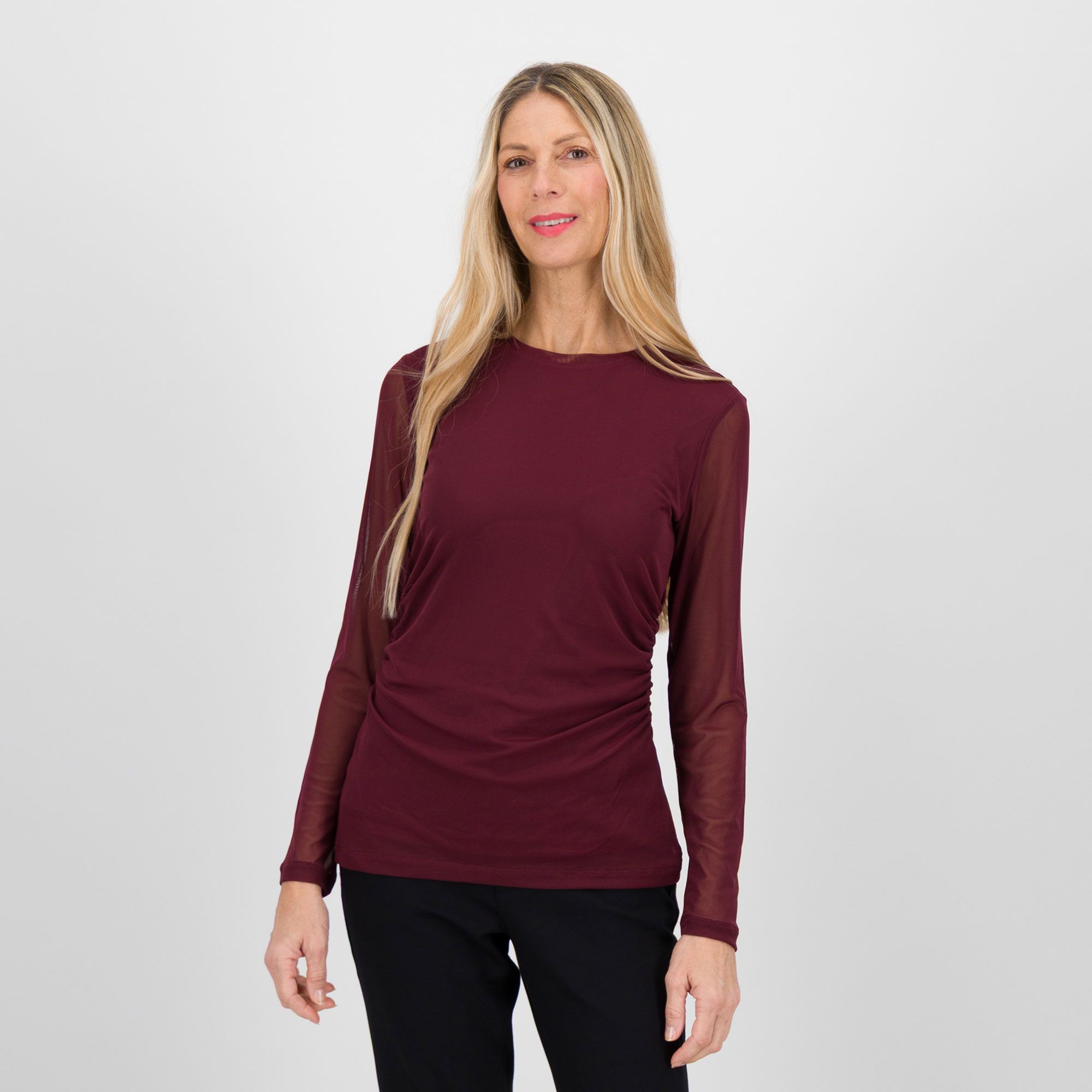 Wynne Layers
Top in tessuto mesh
a maniche lunghe
con arricciature