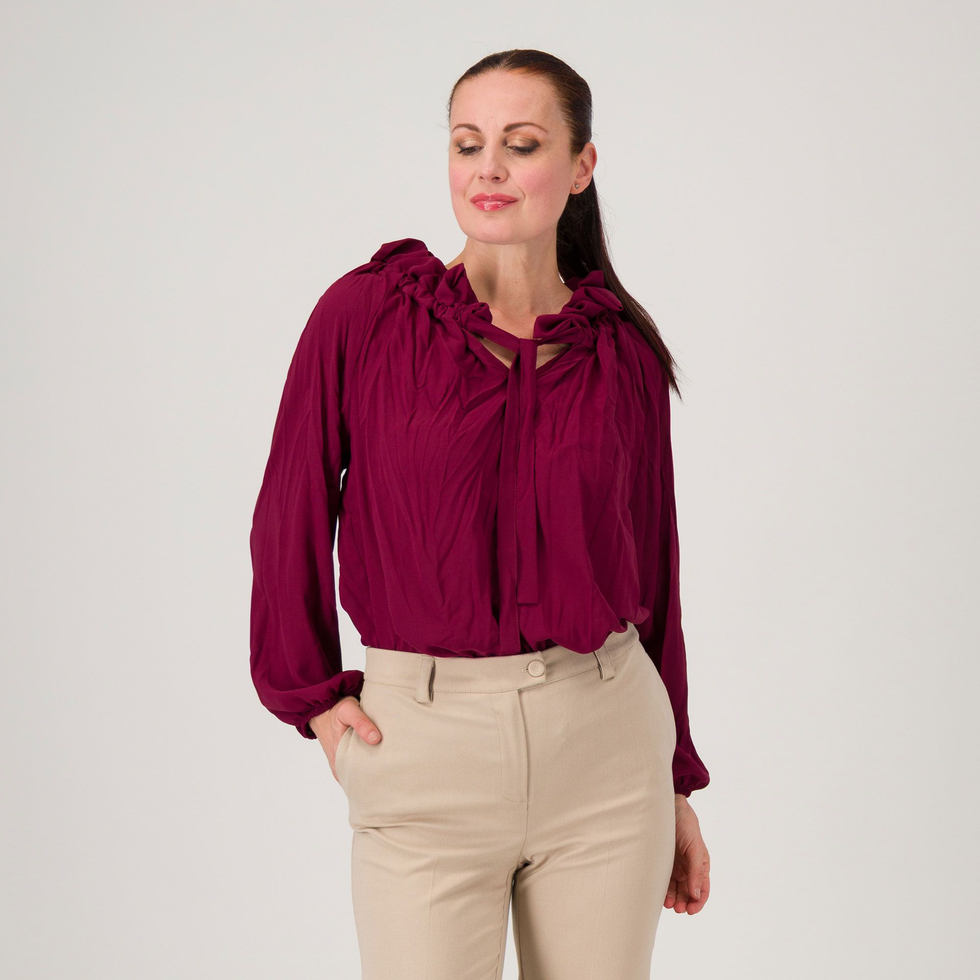 Caterina Lancini
Blusa in raso
opaco di poliestere
a maniche lunghe