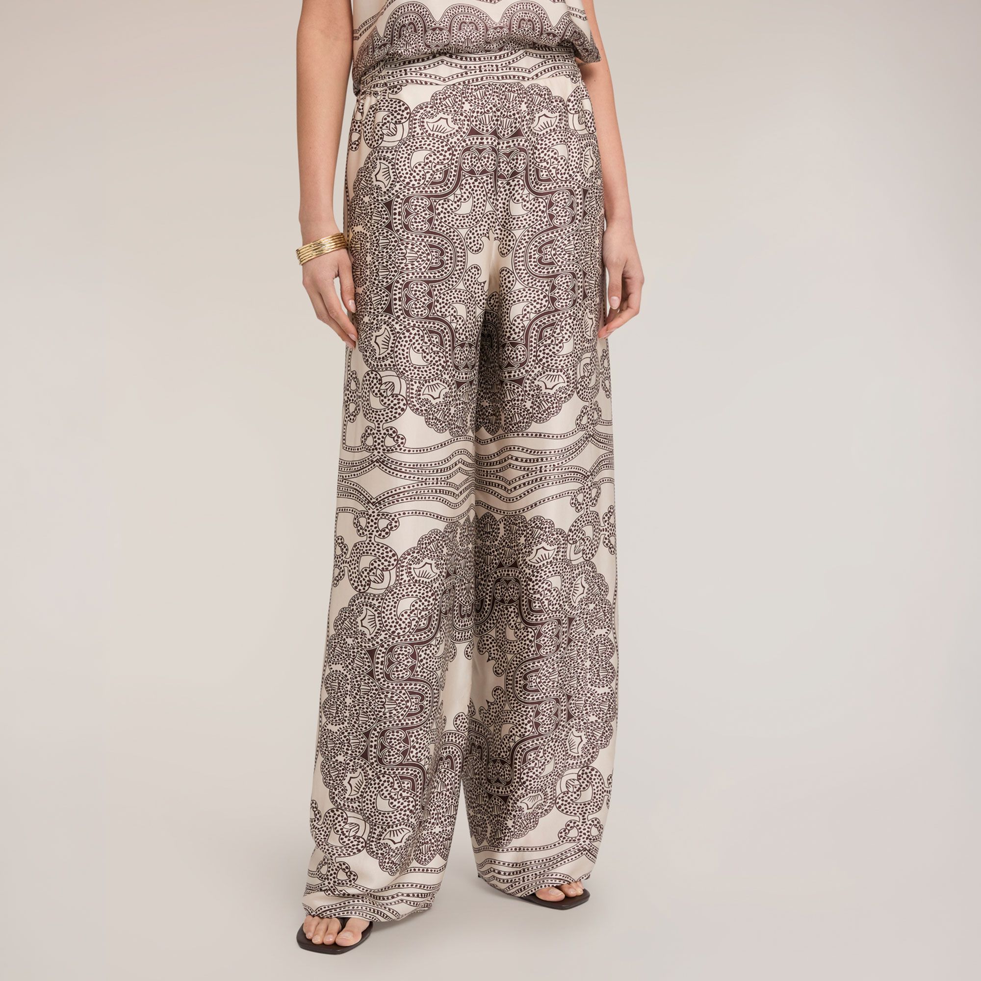 Motivi
Pantaloni palazzo
in raso di viscosa
con elastico