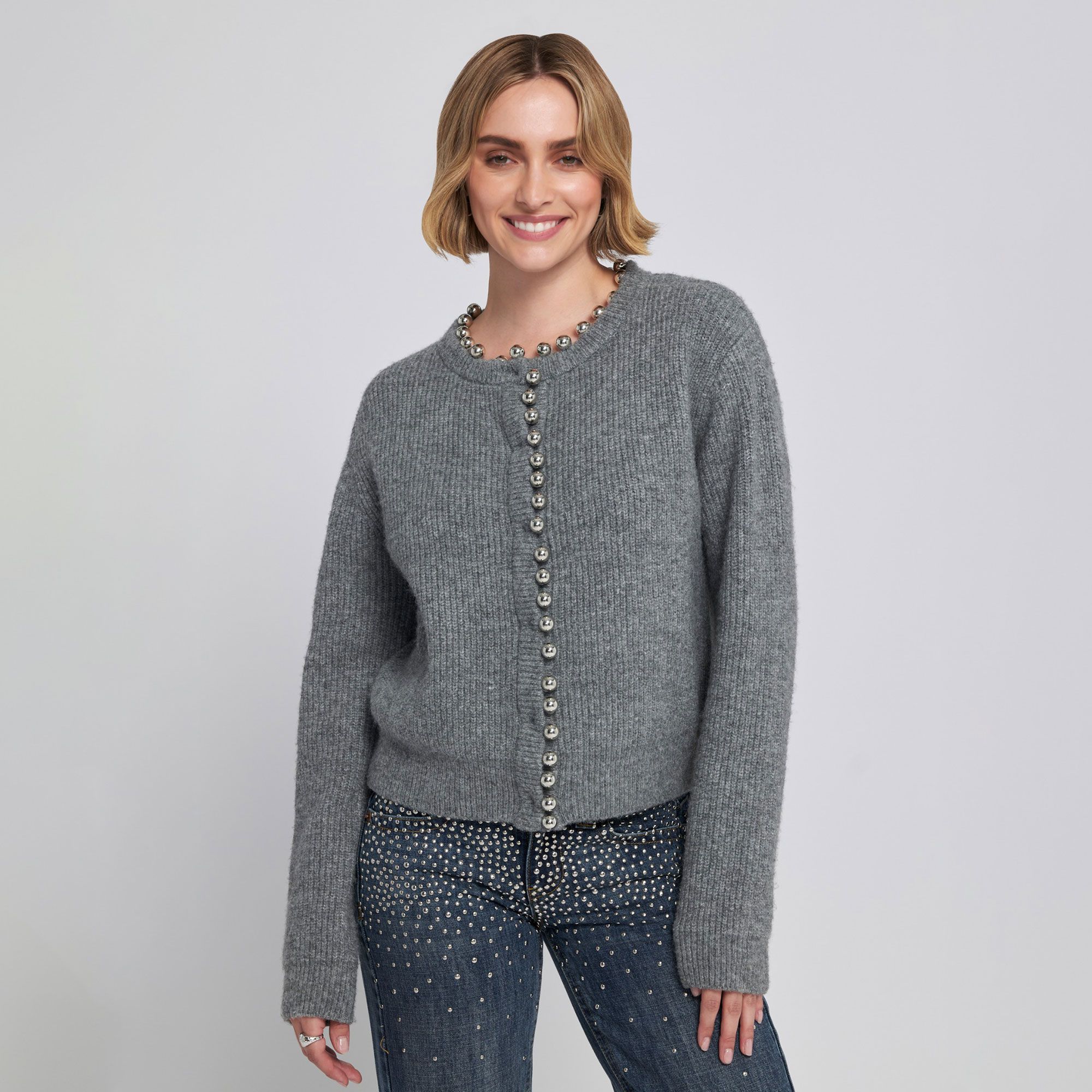 ELLE
Cardigan
con perle