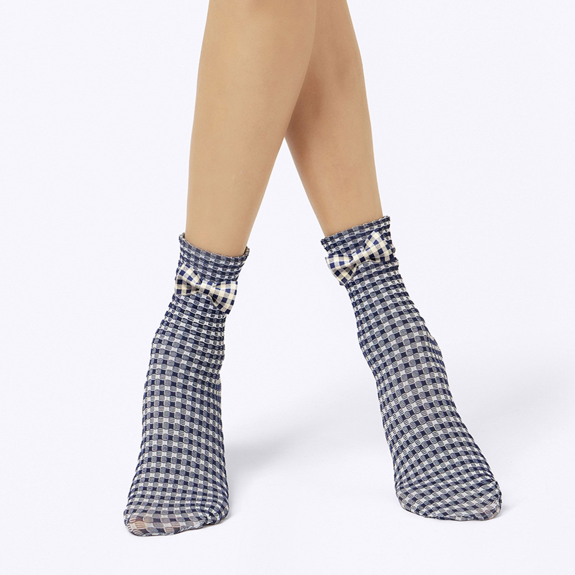 Pierre Mantoux
Calzini con
fiocco sulla
caviglia