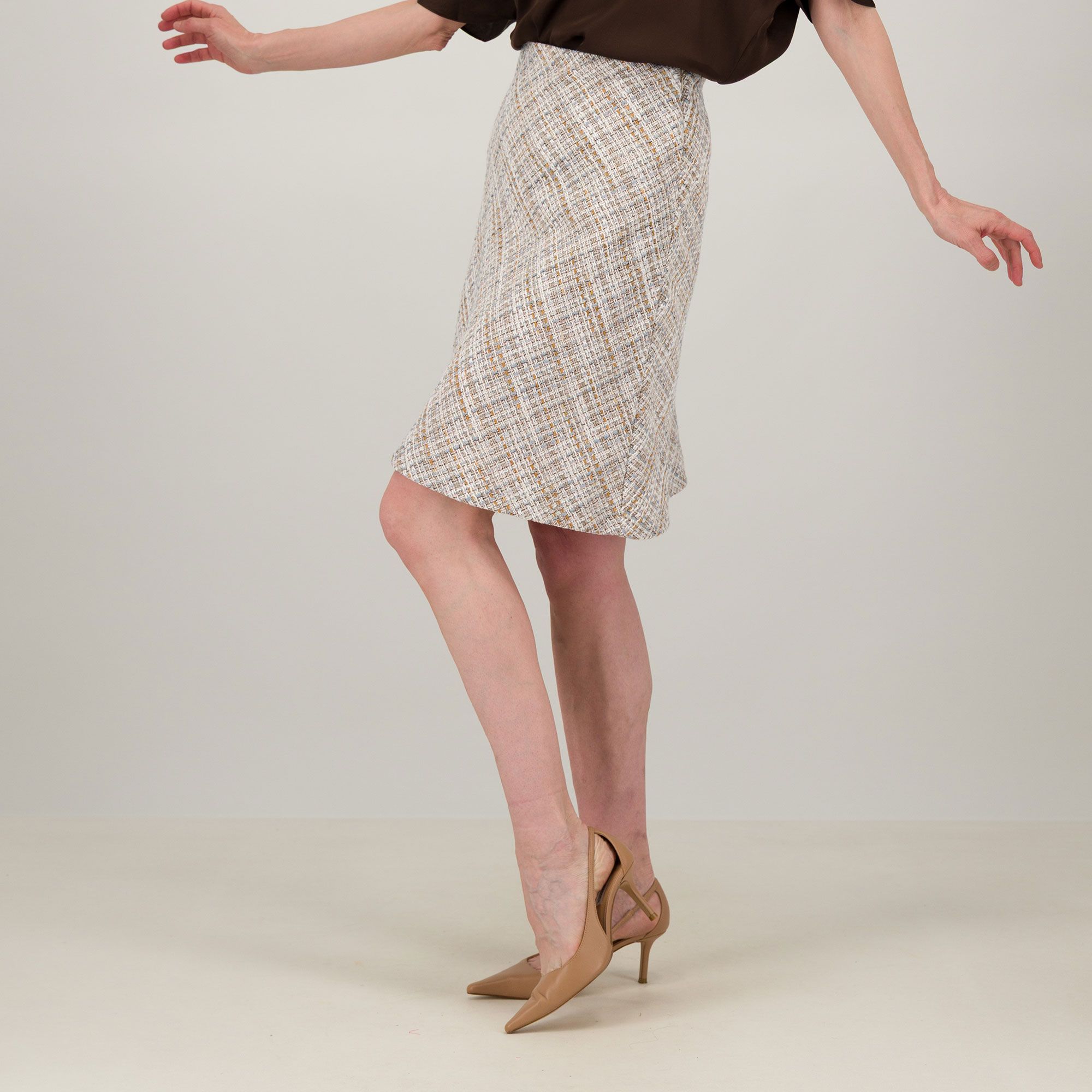 Officina della Moda
Gonna corta
in tessuto bouclé
con elastico