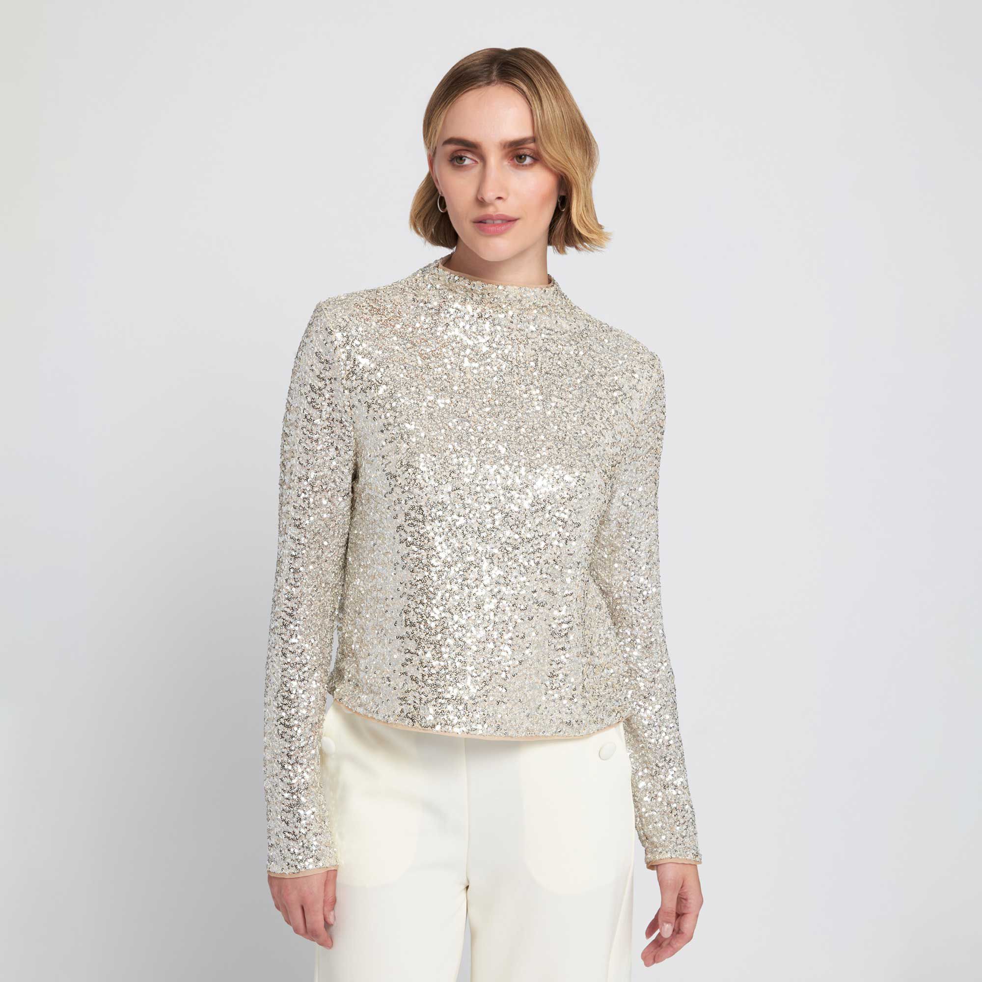 Elle Get The Look
Maglia a collo alto
in paillette