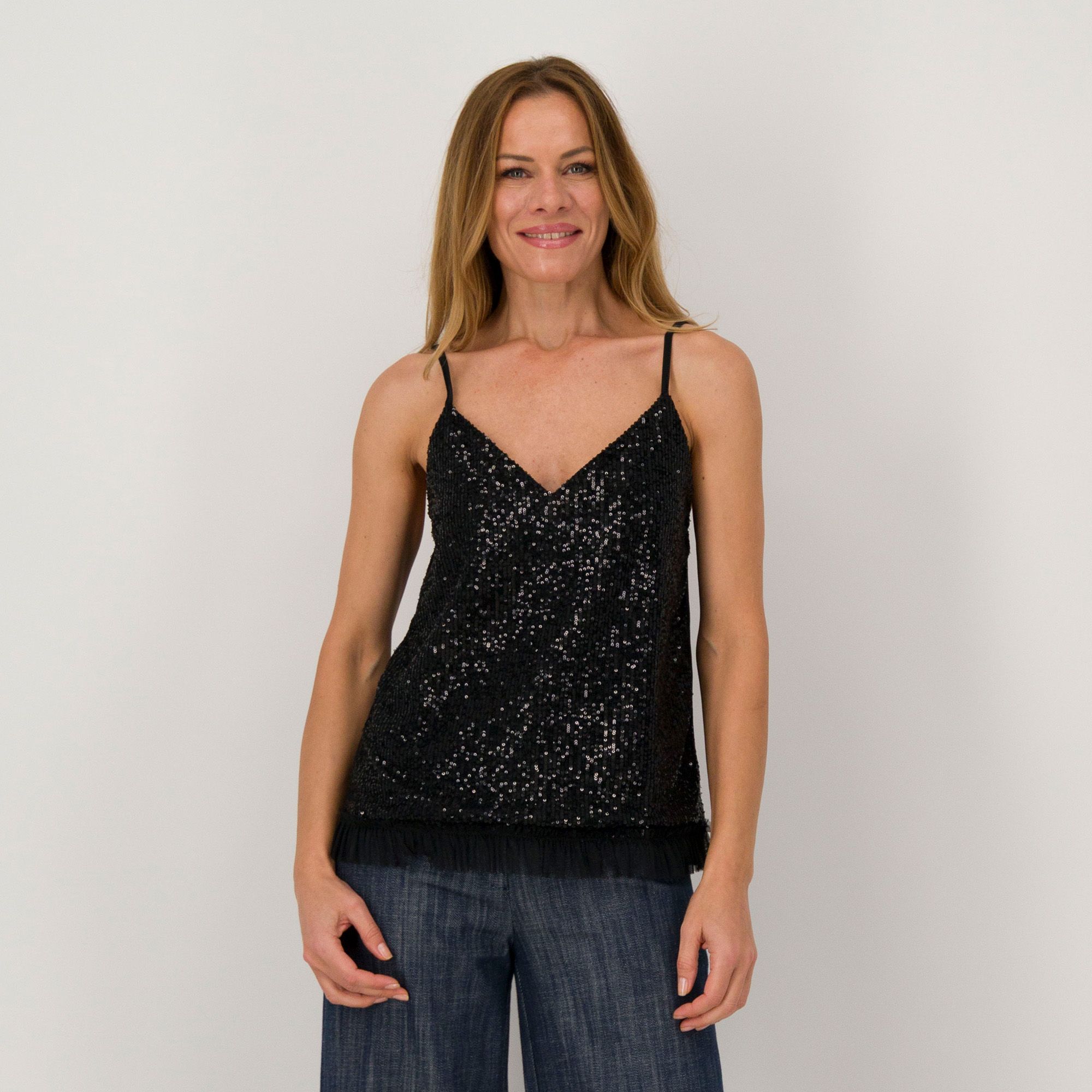 James Lakeland
Top smanicato
con paillettes