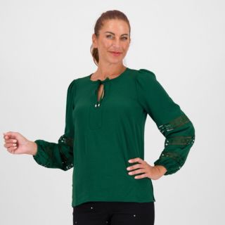 Nina Leonard
Blusa con scollo
tondo a maniche
lunghe