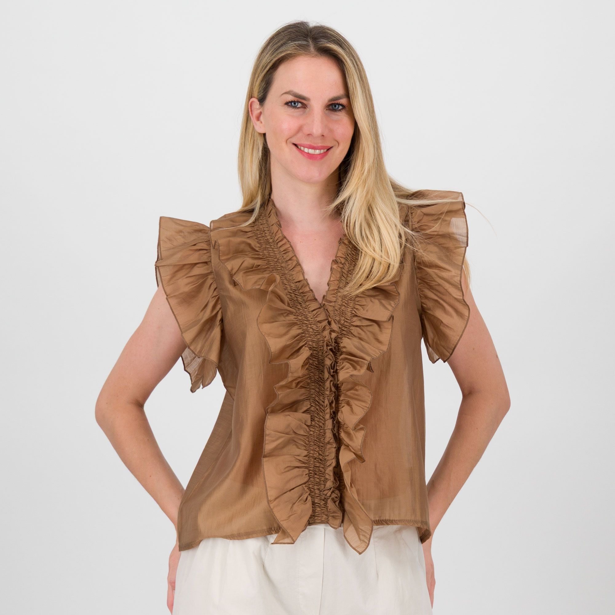 Mood Atelier
Blusa scollo a V con
maniche corte volant