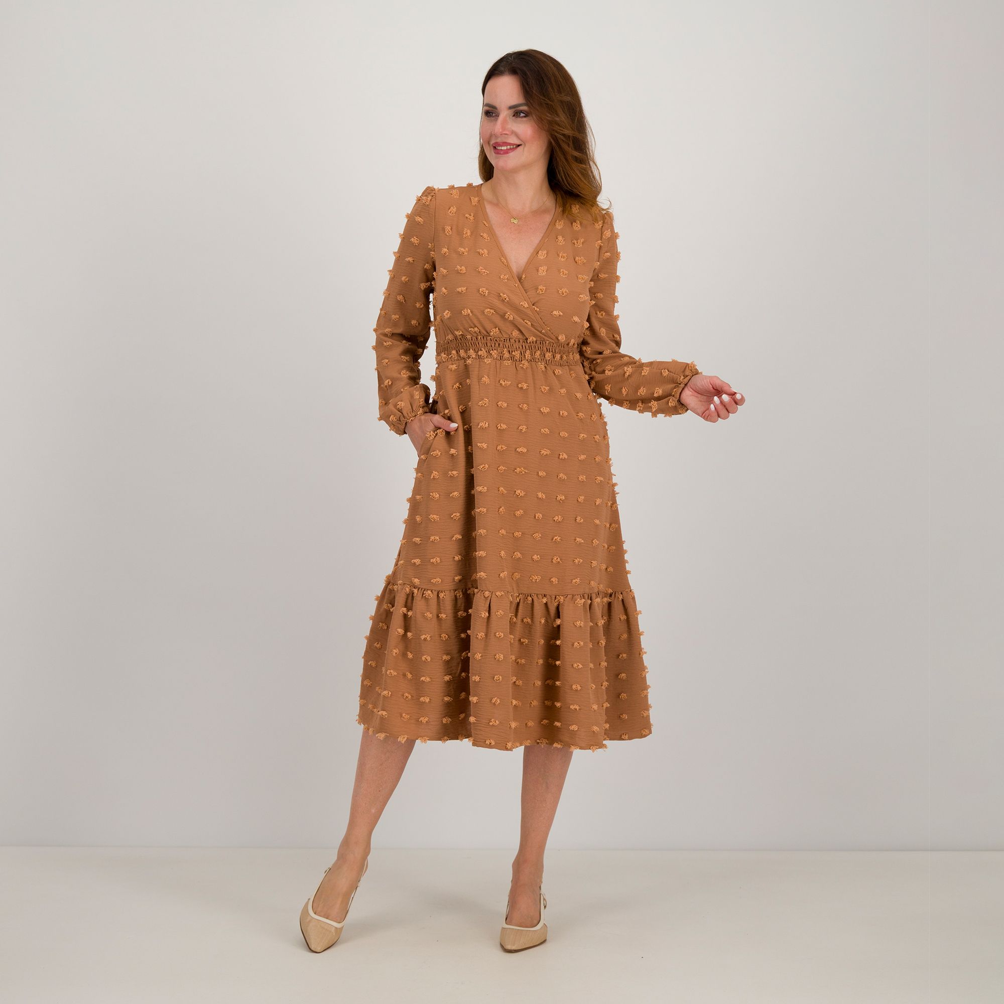 Nina Leonard
Abito midi
a maniche lunghe