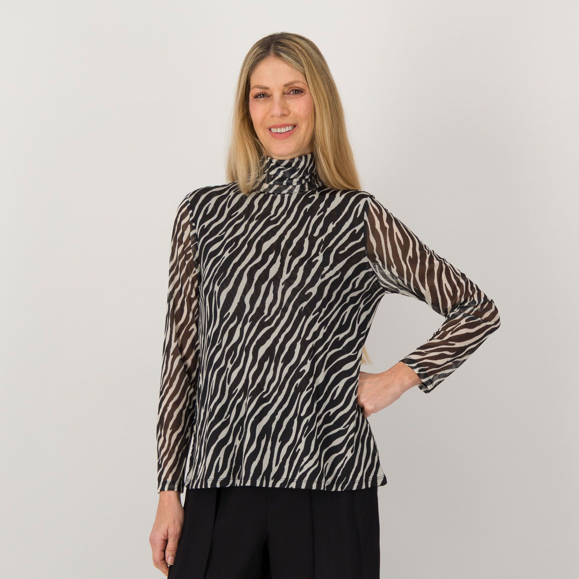 Wynne Layers
Maglia girocollo
in tulle fantasia