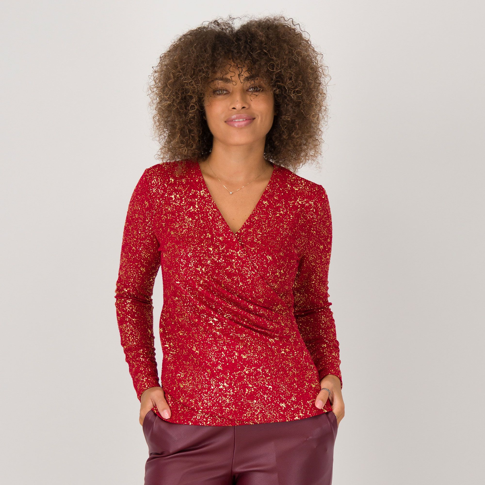 Nina Leonard
Maglia scollo a V
fantasia laminata