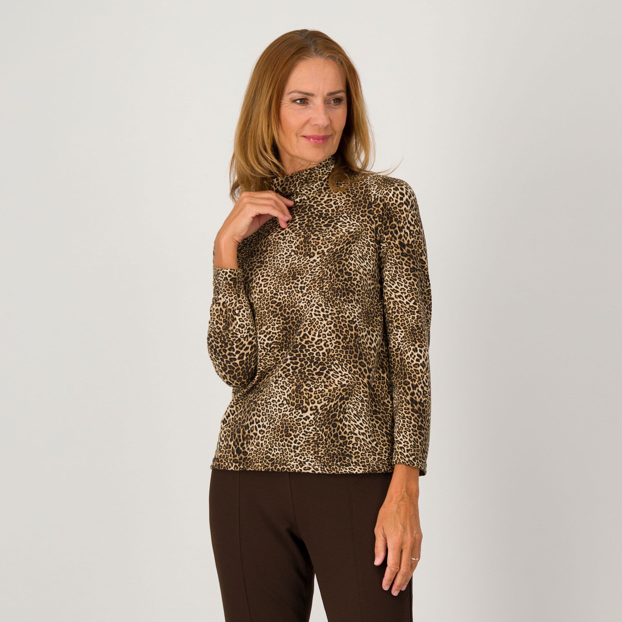 Officina della Moda
Maglia a collo
alto fantasia
animalier