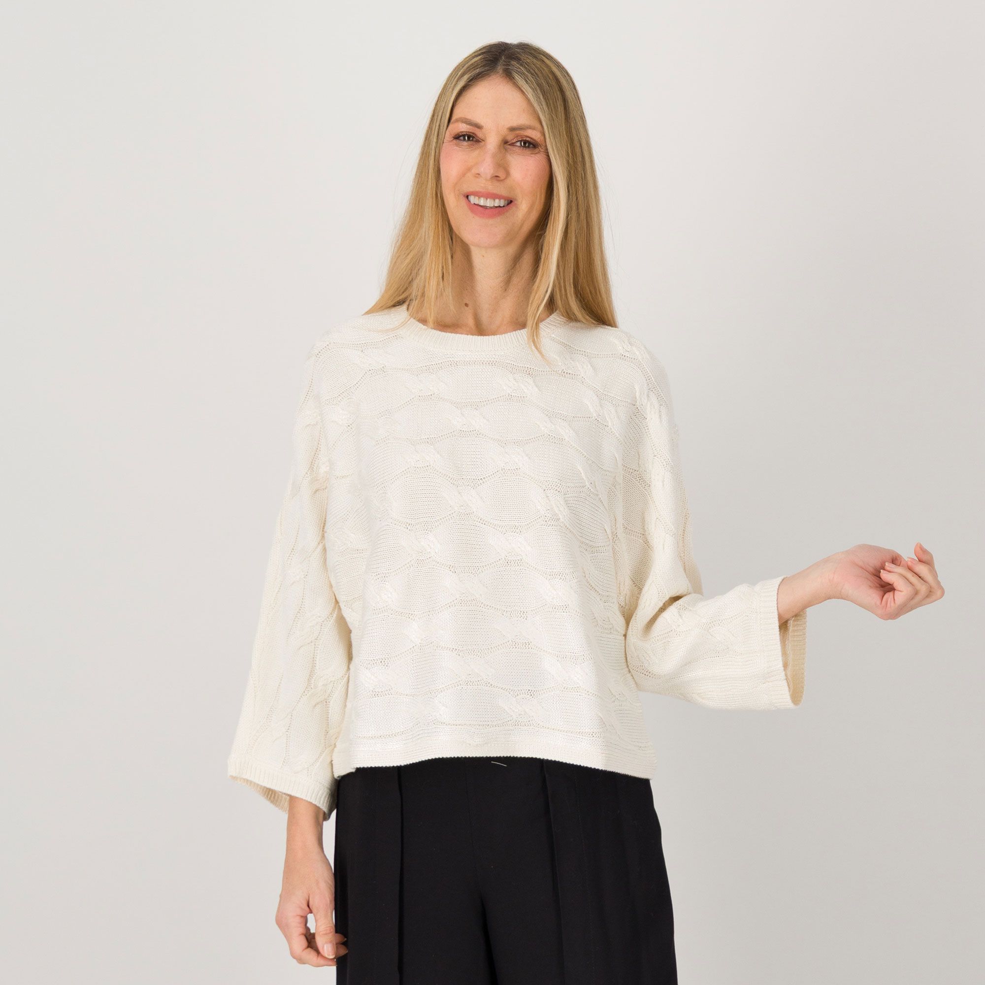 Wynne Layers
Maglione a trecce
con maniche ampie