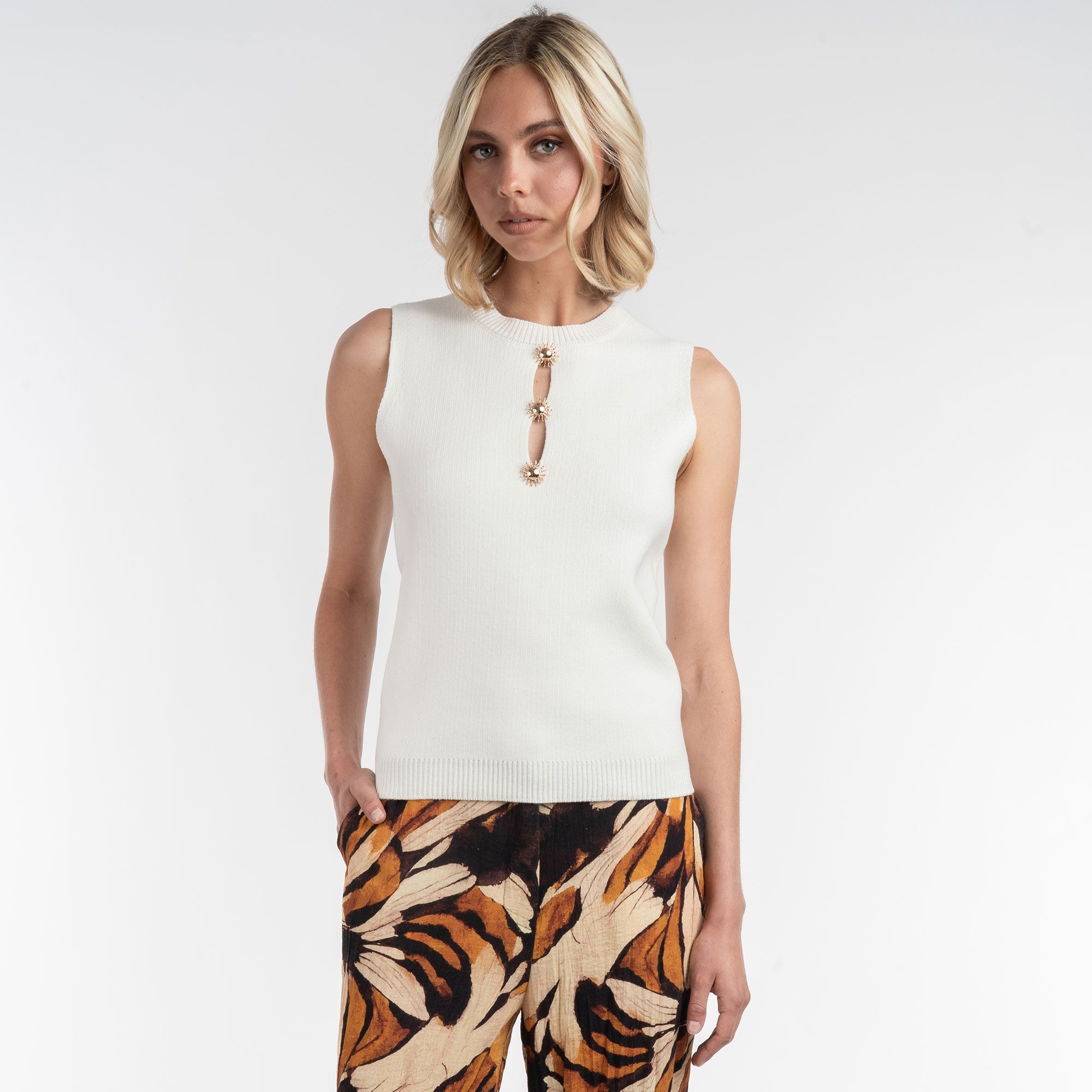 ELLE
Top smanicato