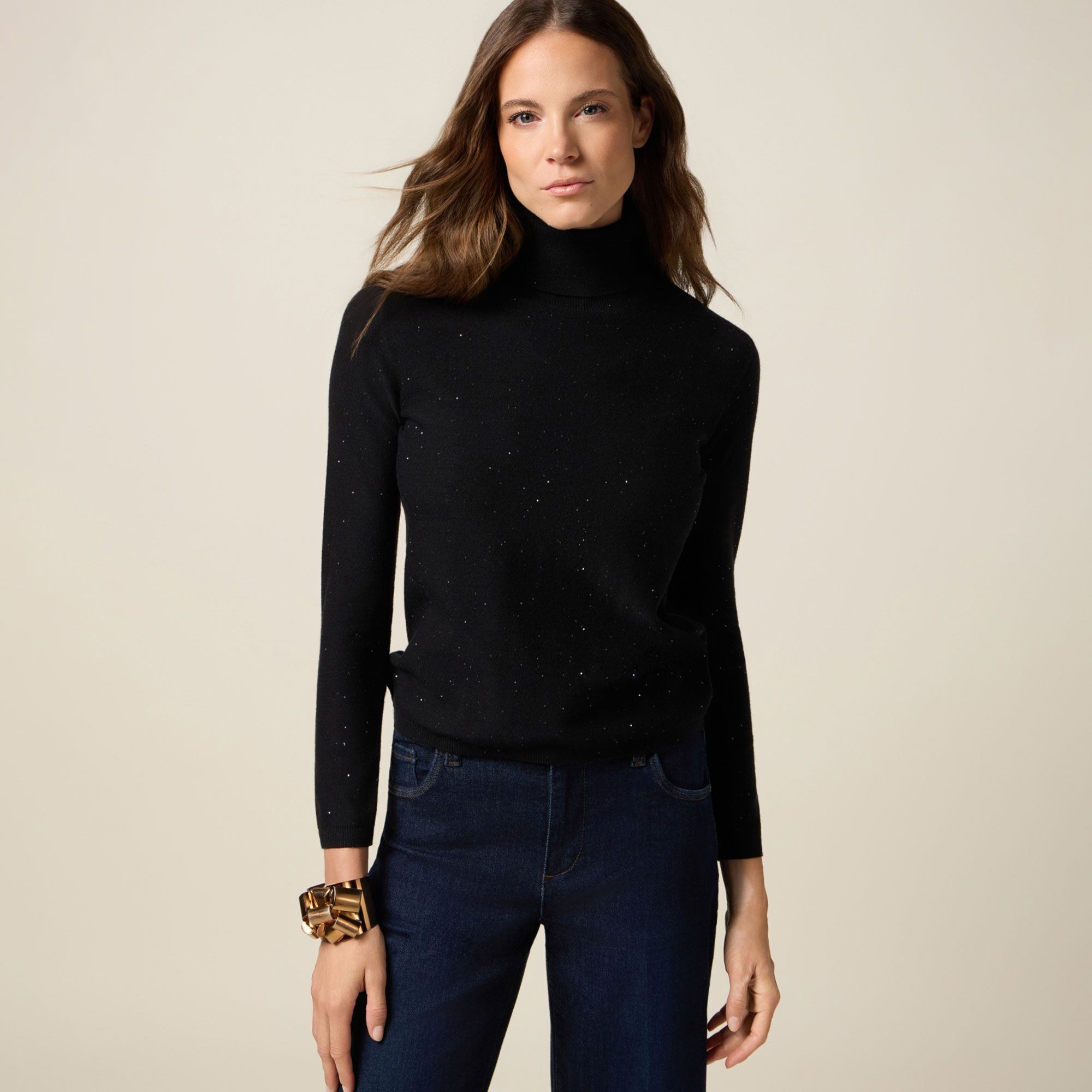 Oltre
Maglia
a collo alto
con paillettes