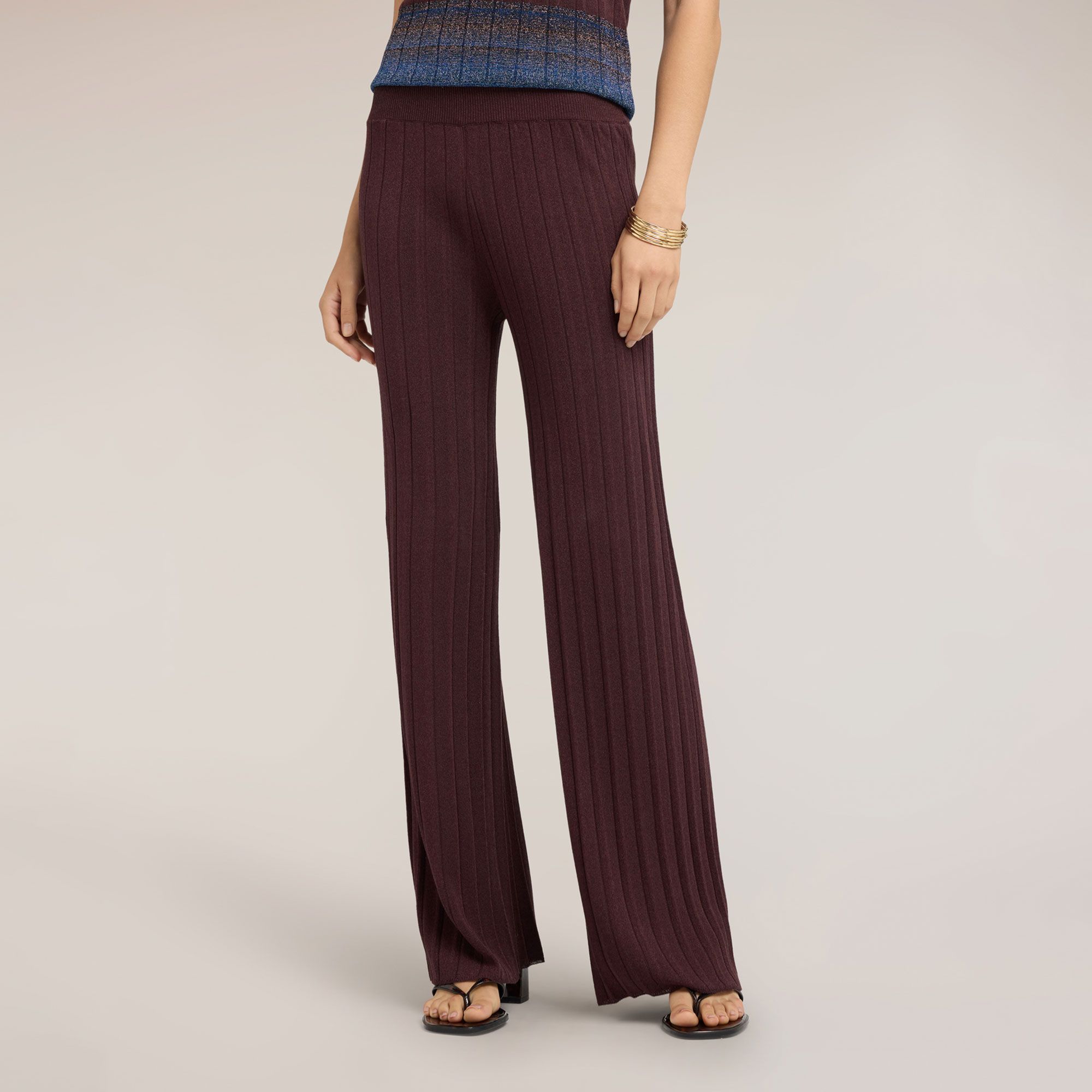 Motivi
Pantaloni palazzo
in maglia plissettata
con elastico