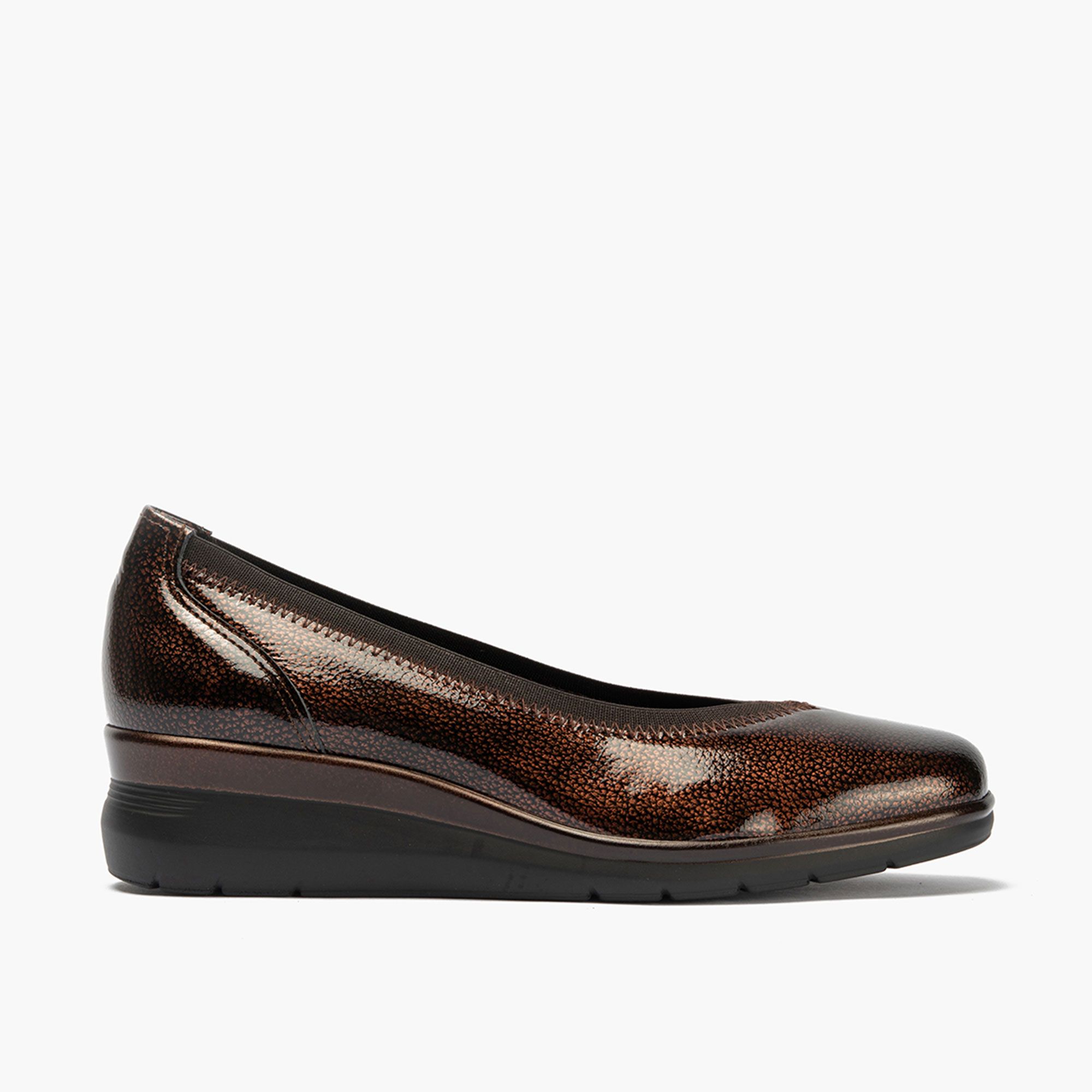 Pitillos
Ballerine in pelle
verniciata
con zeppa 4cm