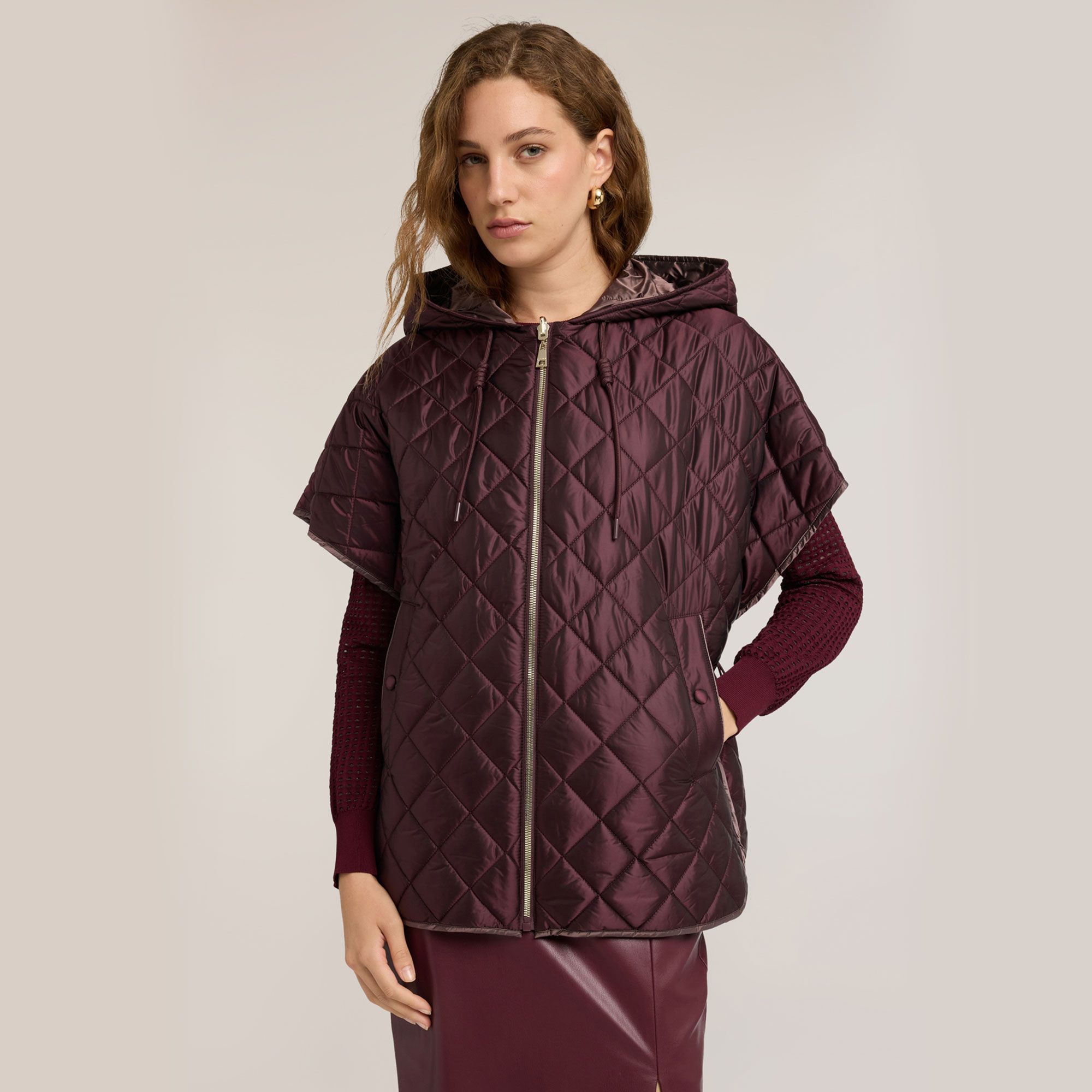 Motivi
Gilet reversibile
in nylon con
cappuccio