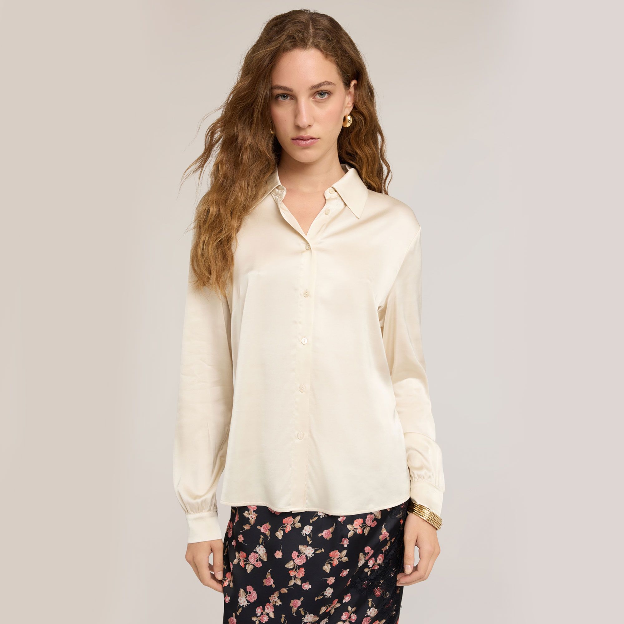 Motivi
Camicia in raso
a maniche
lunghe