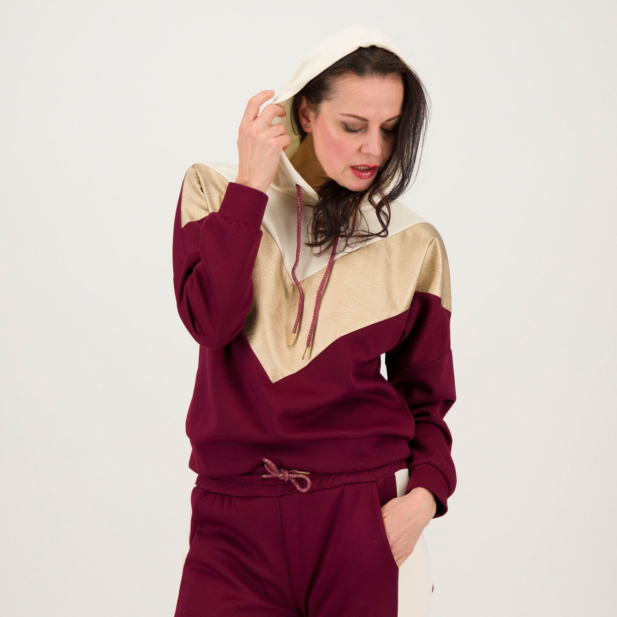 L'Una
Felpa color block con
cappuccio