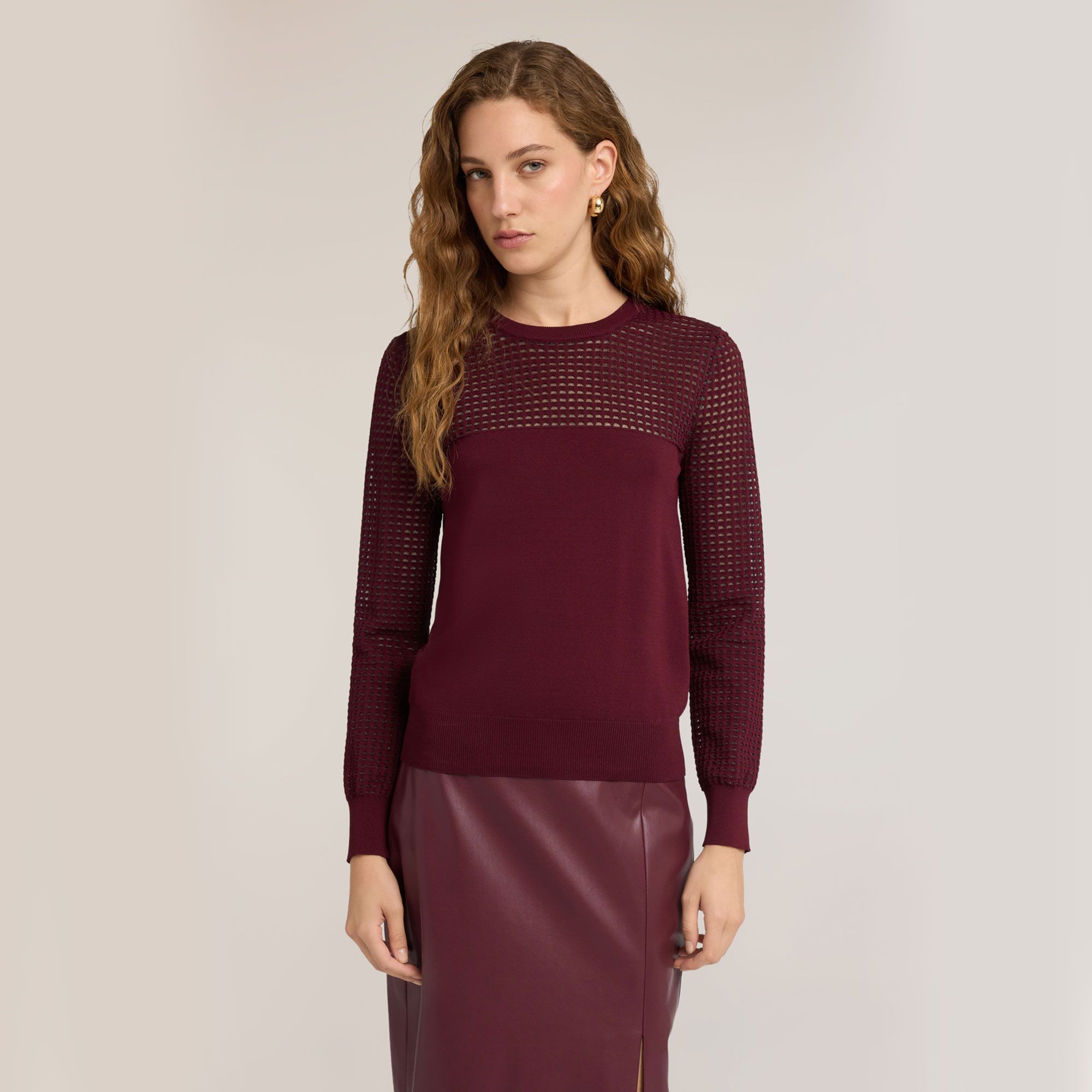 Motivi
Maglione a
maniche lunghe con
scollatura tonda