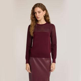 Motivi
Maglione a
maniche lunghe con
scollatura tonda