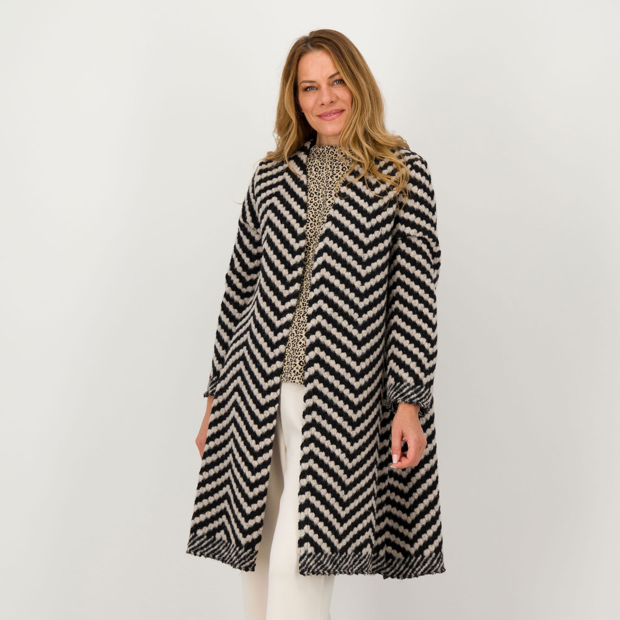 Bianca Della Torre
Cappotto 
in maglia
fantasia