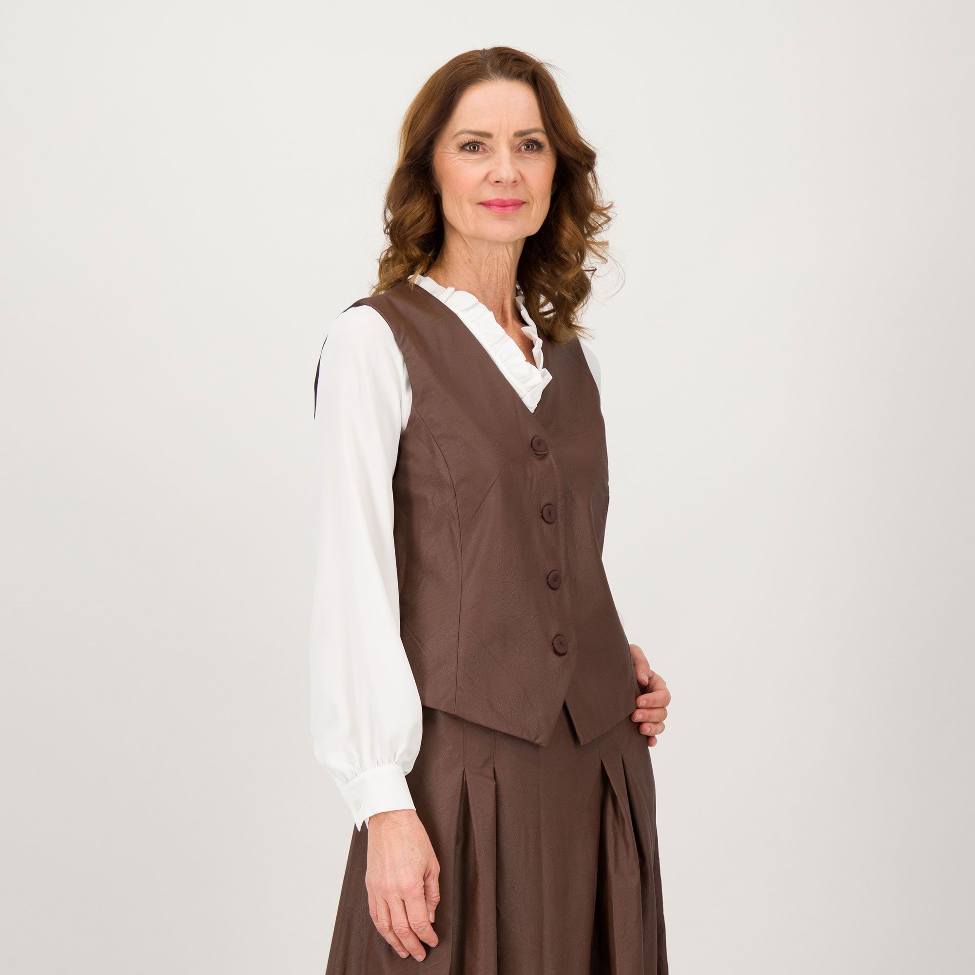 Officina della Moda
Gilet corto
in tessuto spalmato