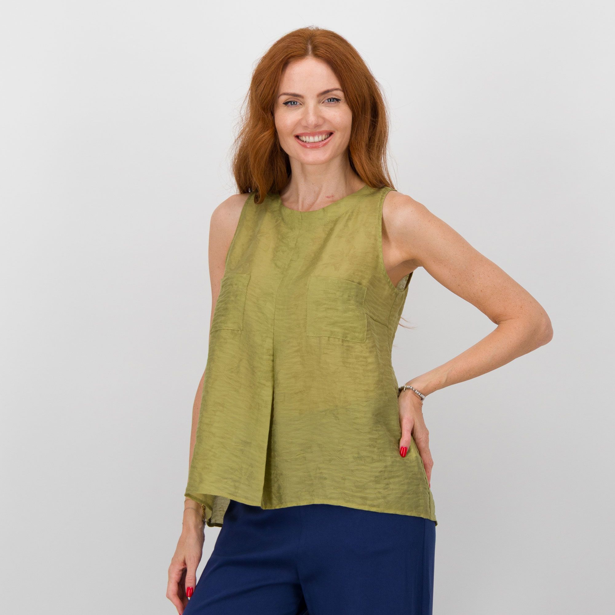 Caterina Lancini
Top smanicato
in tessuto ricamato