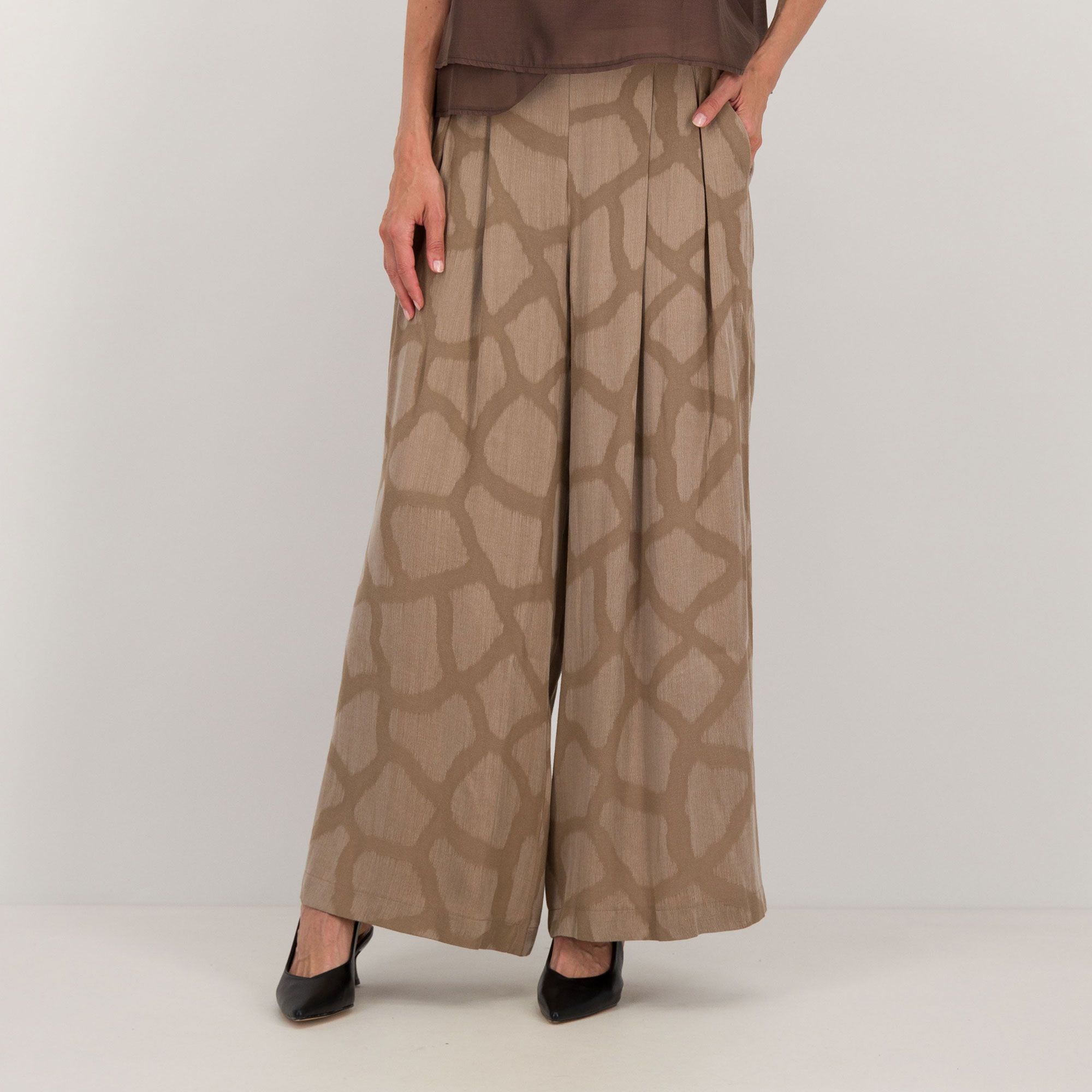  PALAZZO MODA
Pantaloni ampi
animalier
elastico in vita