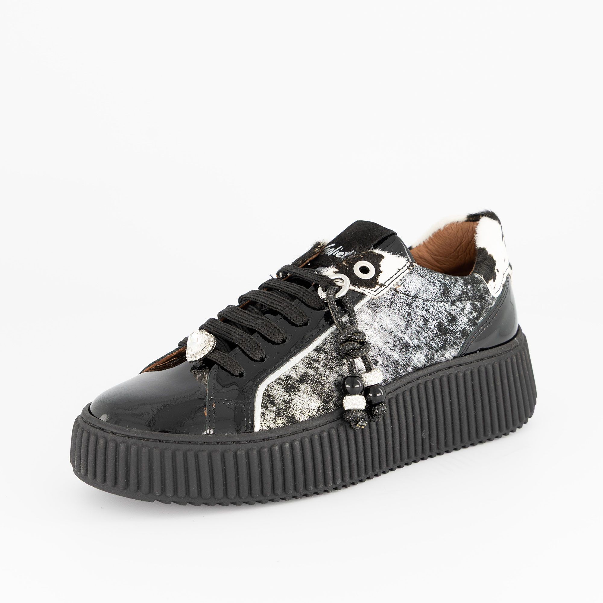 Galieti
Sneaker
in pelle vernice
con suola 5 cm