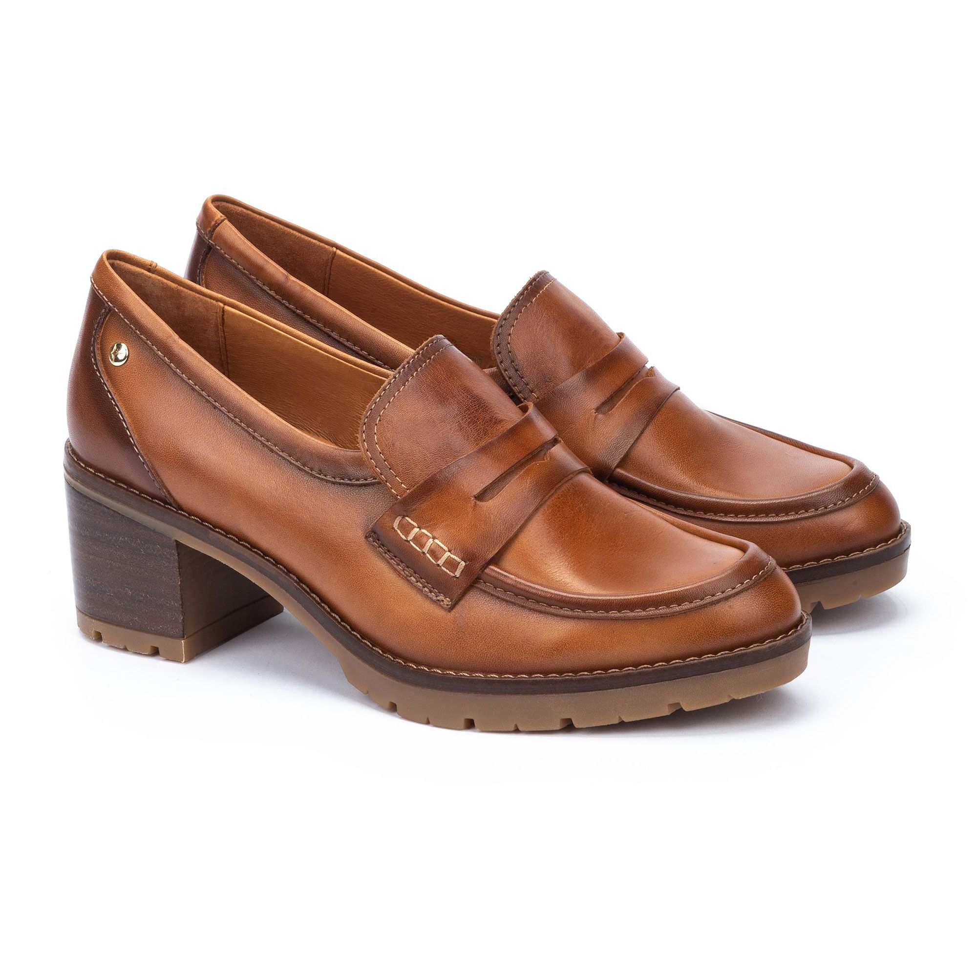 Pikolinos
Mocassini in pelle
con cuciture in
rilievo e tacco 6 cm