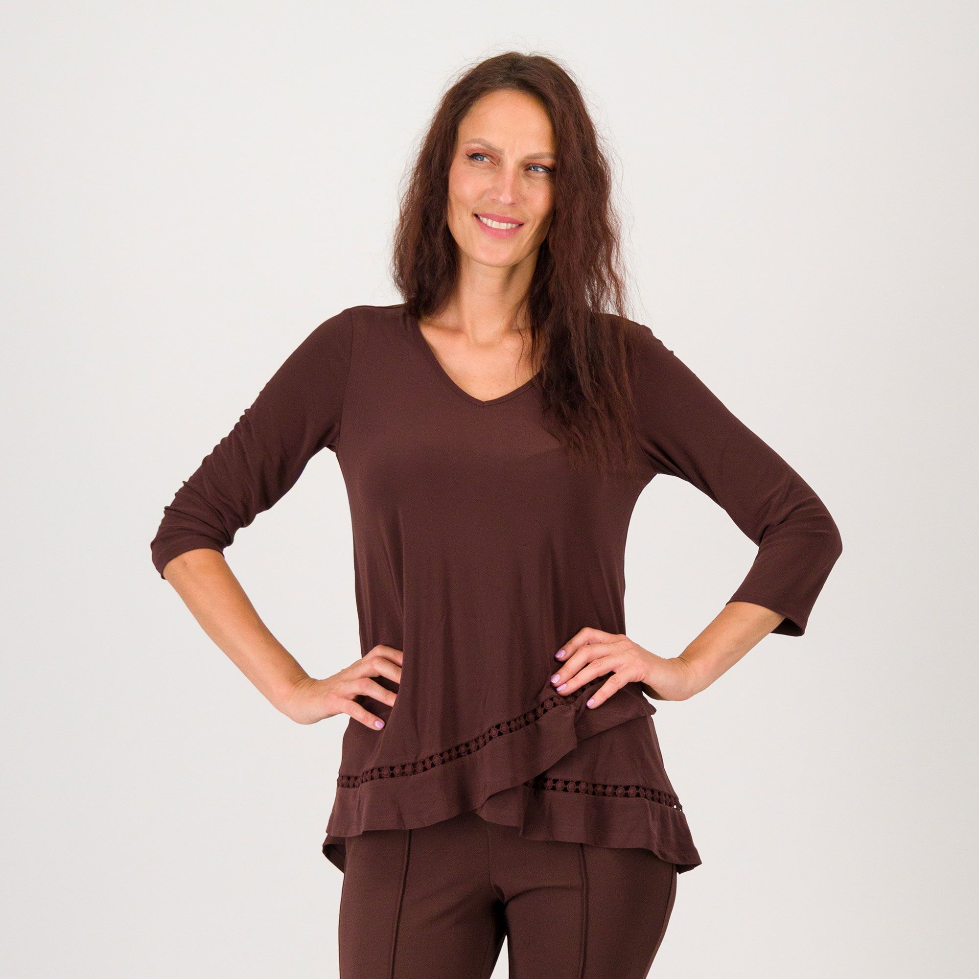 Nina Leonard
Blusa in jersey
stretch con scollo
a V