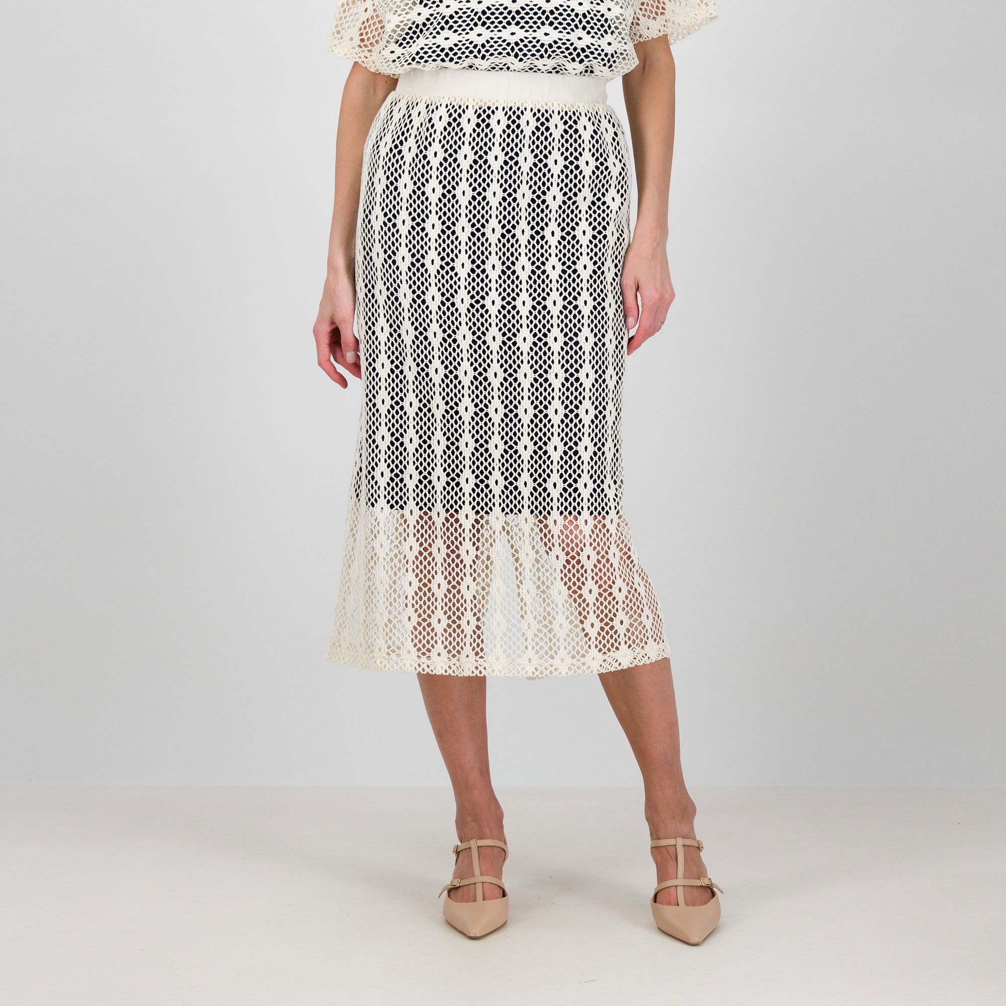 Officina della Moda
Gonna in pizzo
crochet con
elastico