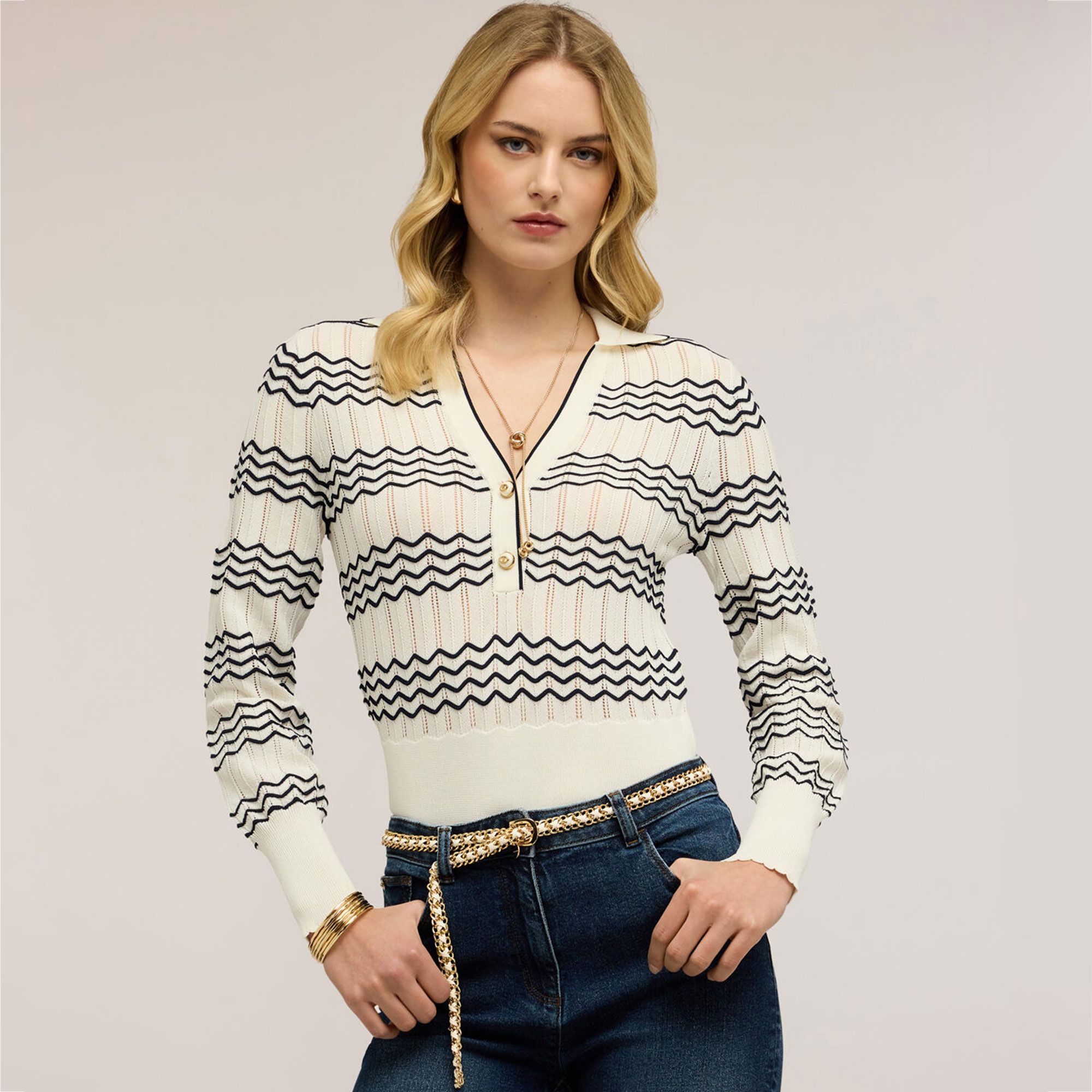 Motivi
Polo in maglia 
fantasia righe a
maniche lunghe